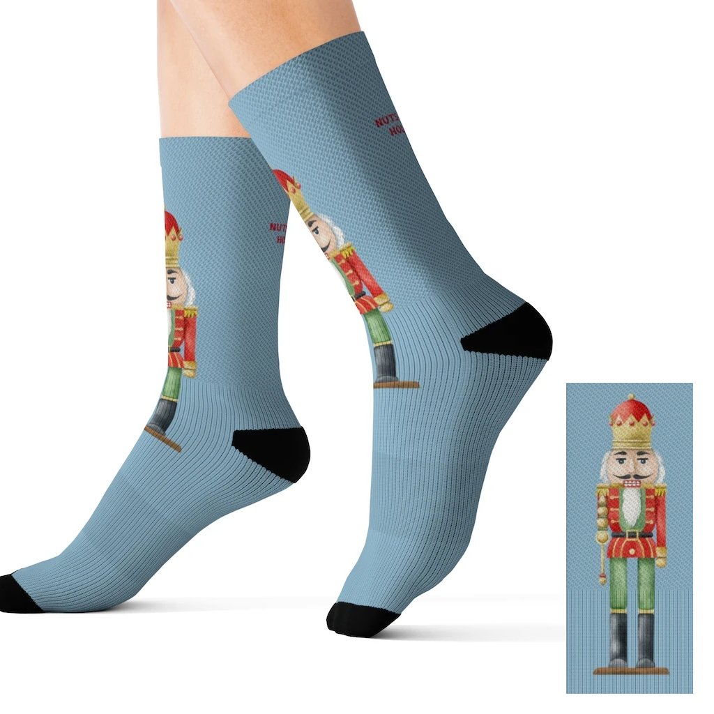 Colorful holiday-themed novelty socks featuring a nutcracker design, perfect for festive occasions.