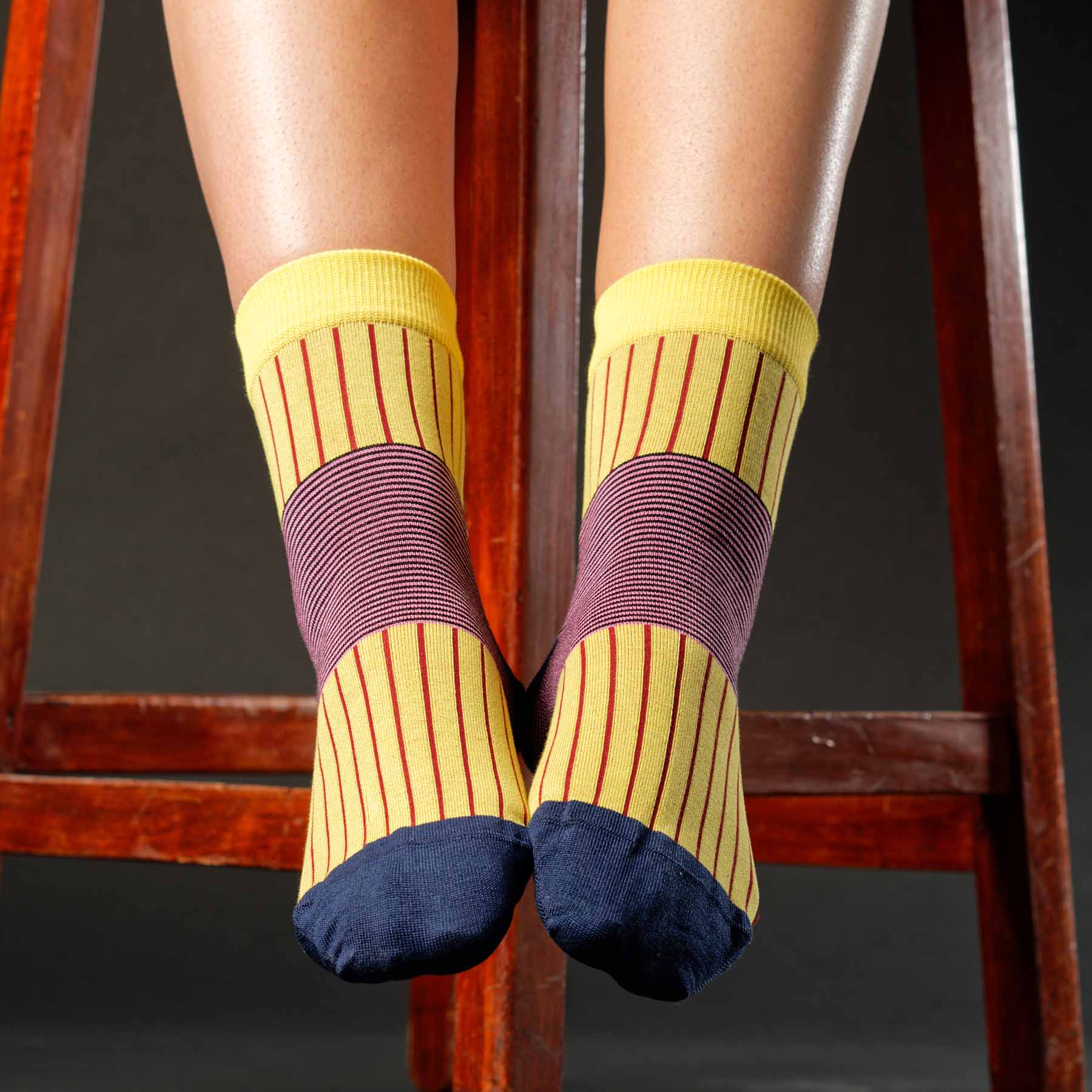 A pair of yellow Oxford Stripe Women's Socks featuring horizontal and vertical stripes, made from luxurious Mercerised Egyptian cotton.