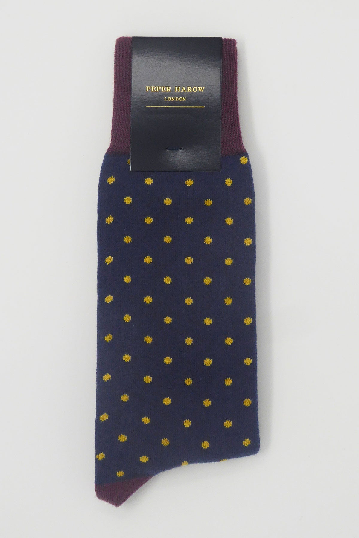 Pin Polka Men's Socks in Denim featuring vibrant polka dots and contrasting cuffs, heels, and toes, made from luxurious Supima cotton.