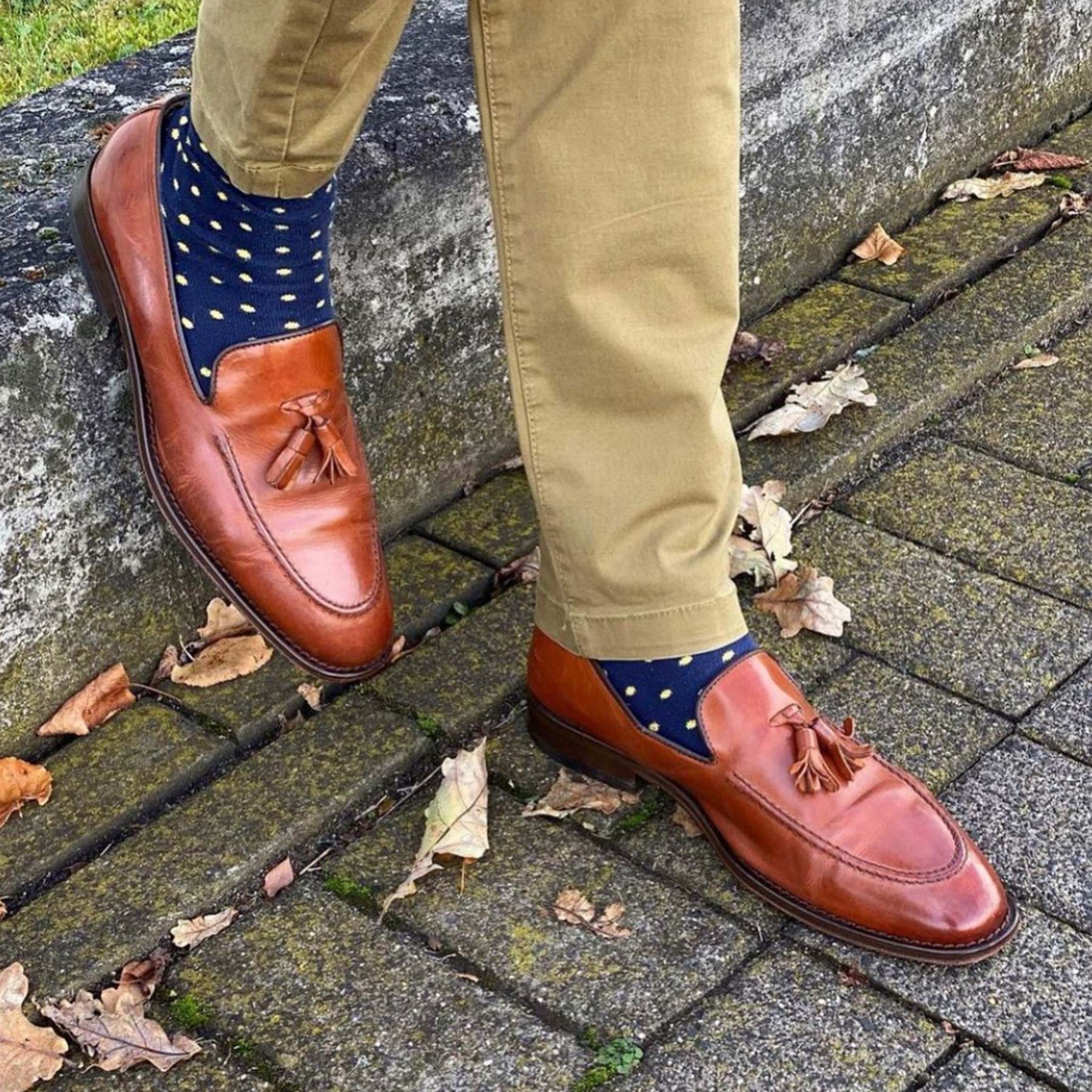 Pin Polka Men's Socks in Denim featuring vibrant polka dots and contrasting cuffs, heels, and toes, made from luxurious Supima cotton.