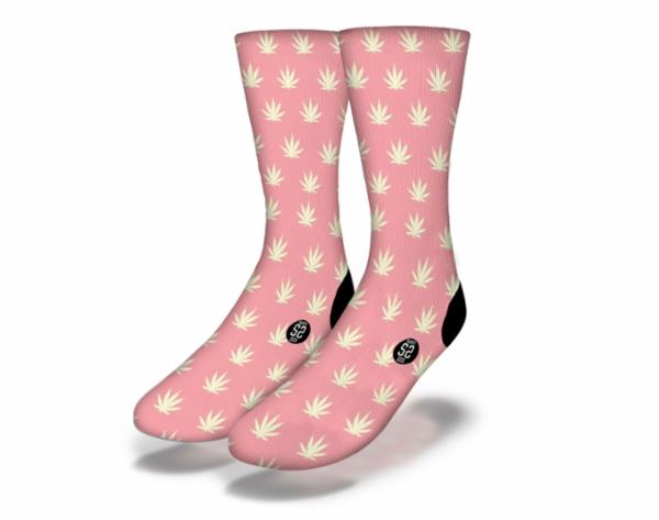 A pair of fun pink socks featuring a vibrant cannabis leaf pattern, perfect for stoner girls.