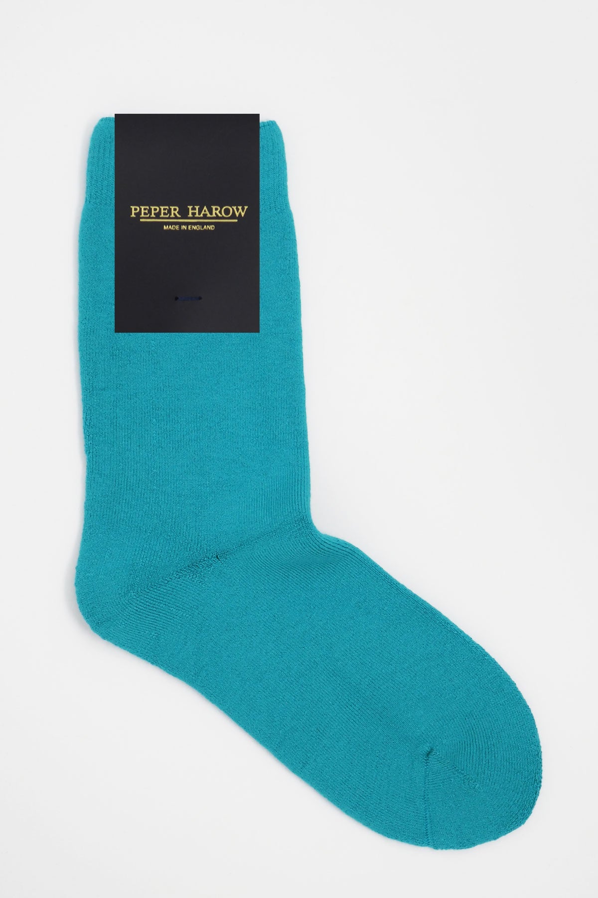 Aqua blue luxury bed socks made from Supima cotton, featuring a fluffy interior and seamless toe design, perfect for men's loungewear.