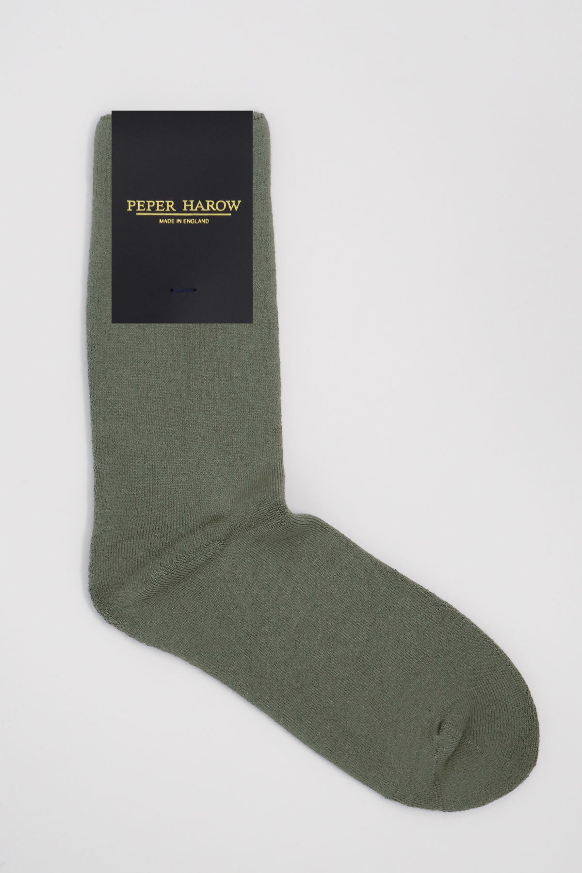 A pair of luxurious grey women's bed socks made from soft Supima cotton, showcasing a fluffy interior and seamless toe design.