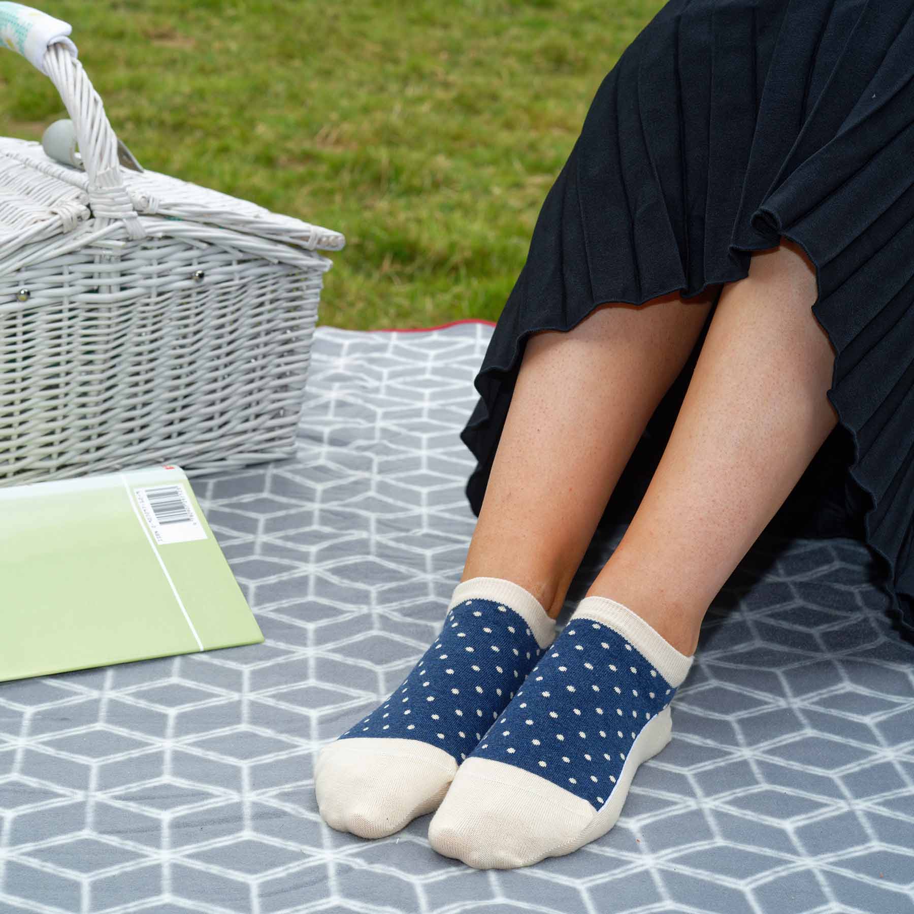 Polka Women's Organic Trainer Socks in beige with denim blue polka dots, showcasing a stylish and eco-friendly design.