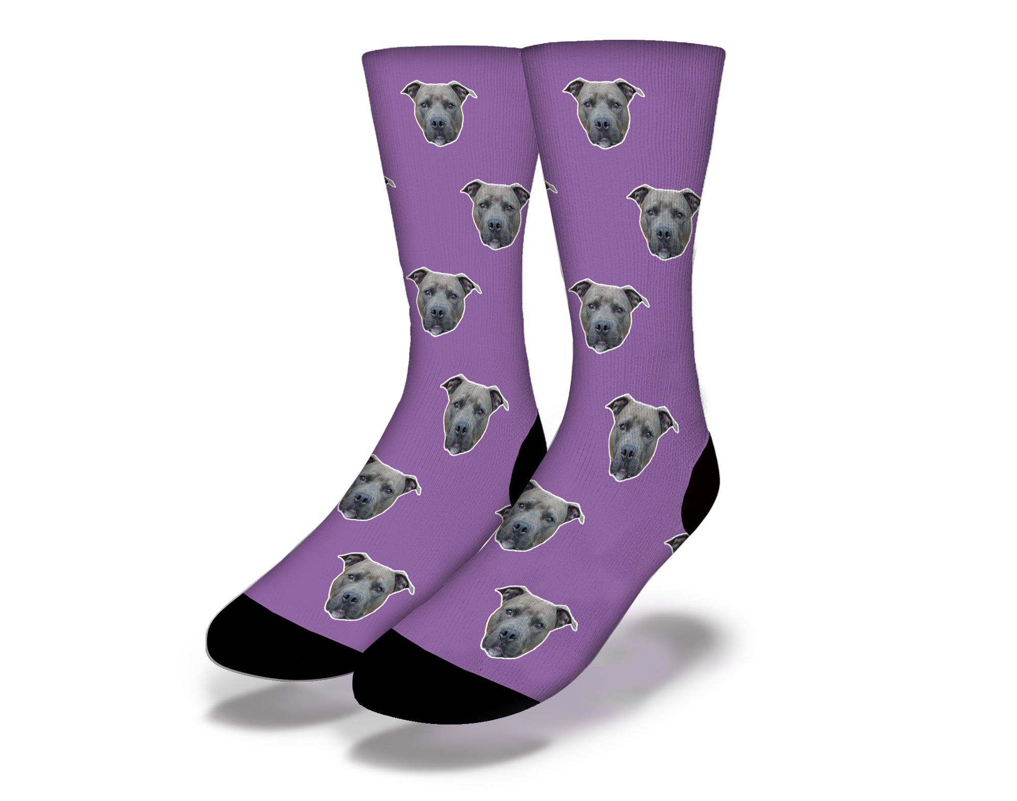 Purple socks featuring an adorable puppy face with big eyes, perfect for dog lovers.