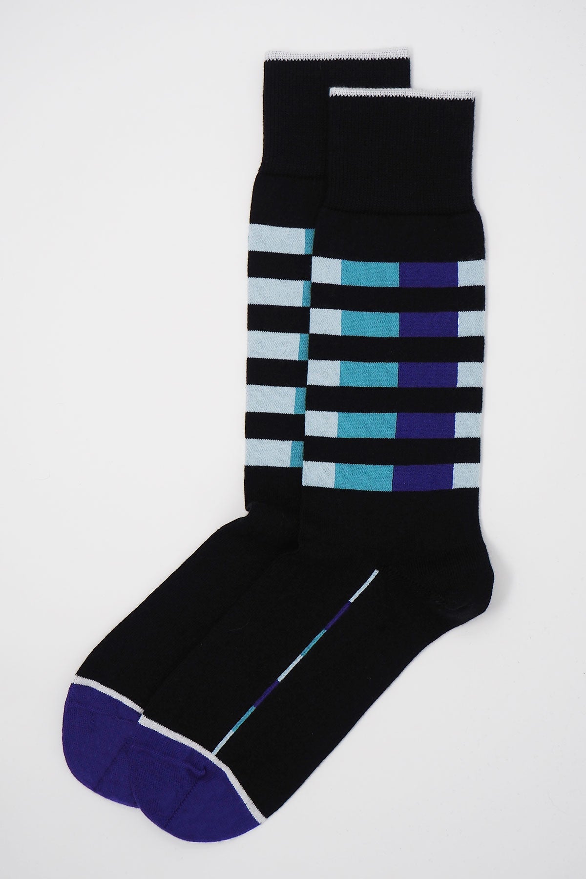 Black men's luxury socks featuring vibrant purple and blue Quad Stripes, made from soft Supima cotton.