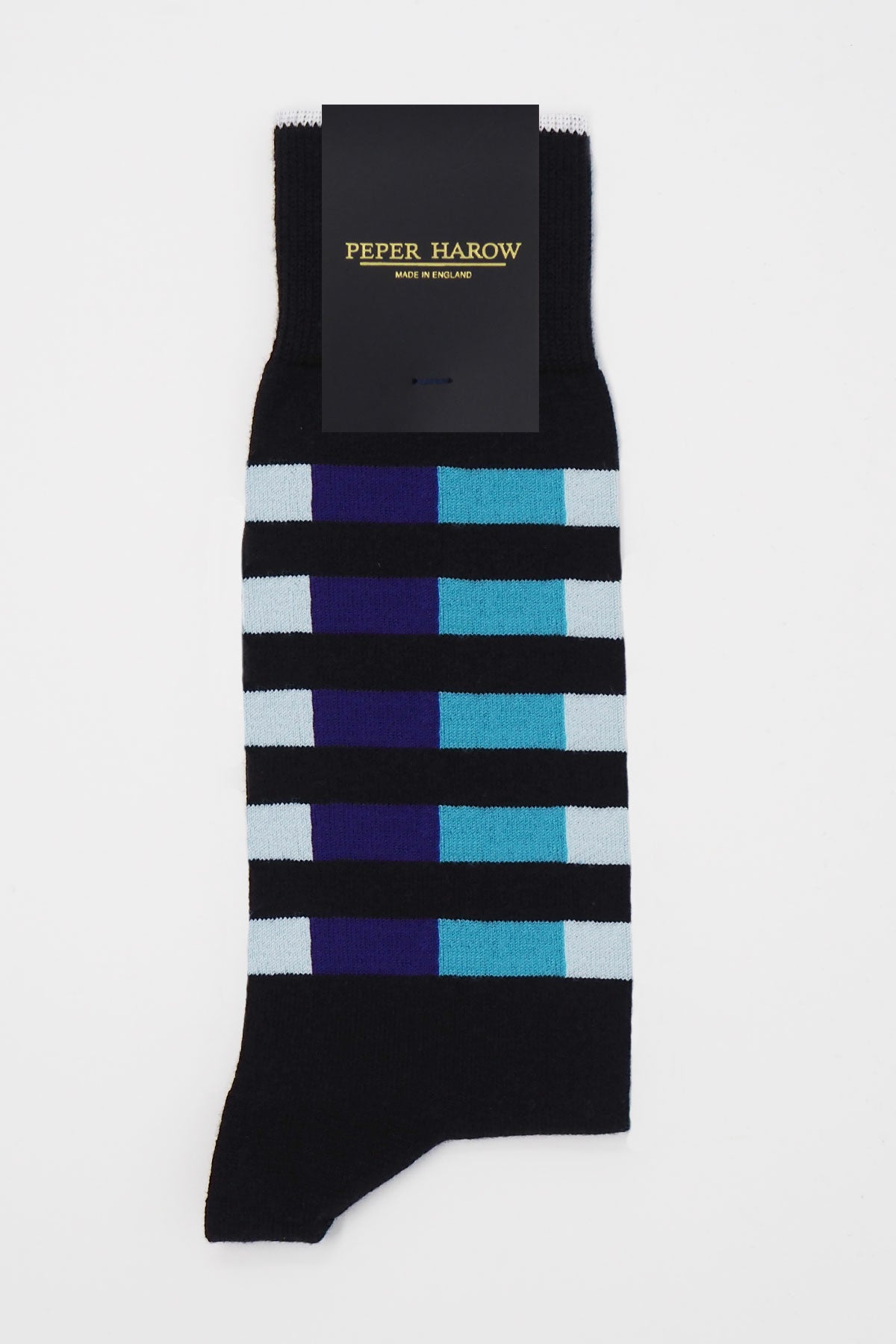 Black men's luxury socks featuring vibrant purple and blue Quad Stripes, made from soft Supima cotton.