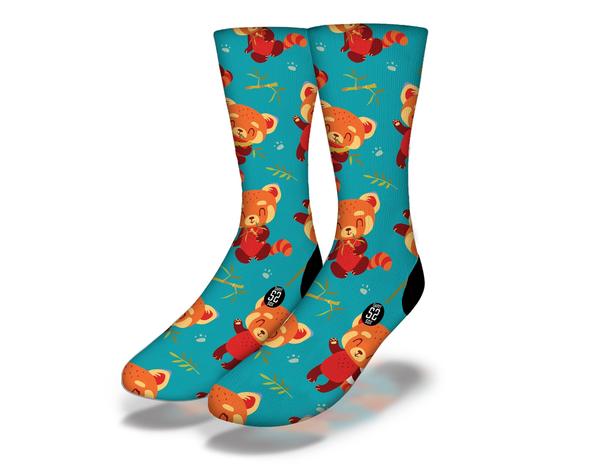 A pair of RED PANDA-STIC fun animal socks featuring a cute red panda design, perfect for animal lovers and cozy wear.