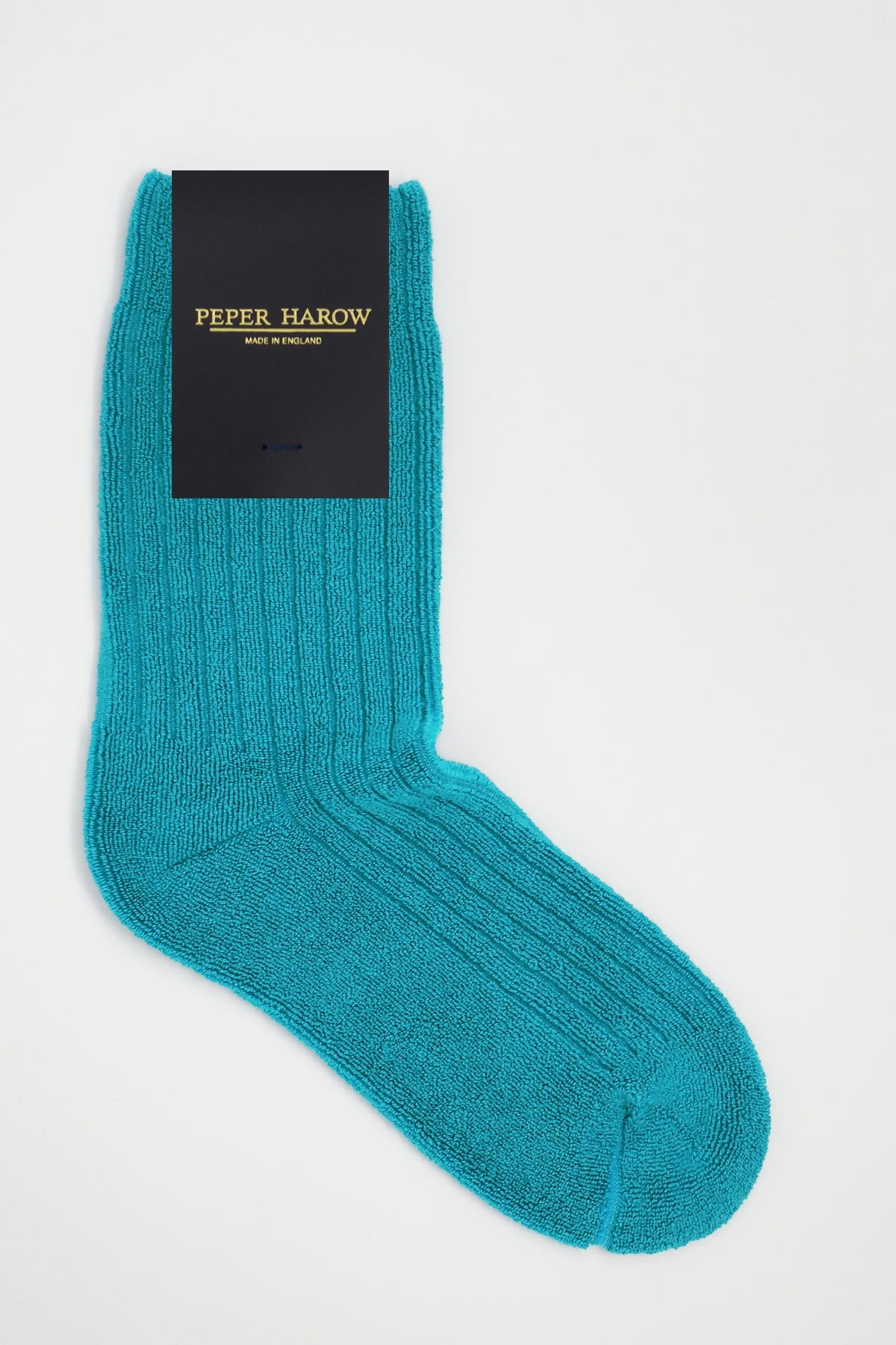 Aqua ribbed men's bed socks made from luxurious Supima cotton, featuring a fluffy pattern for added comfort.