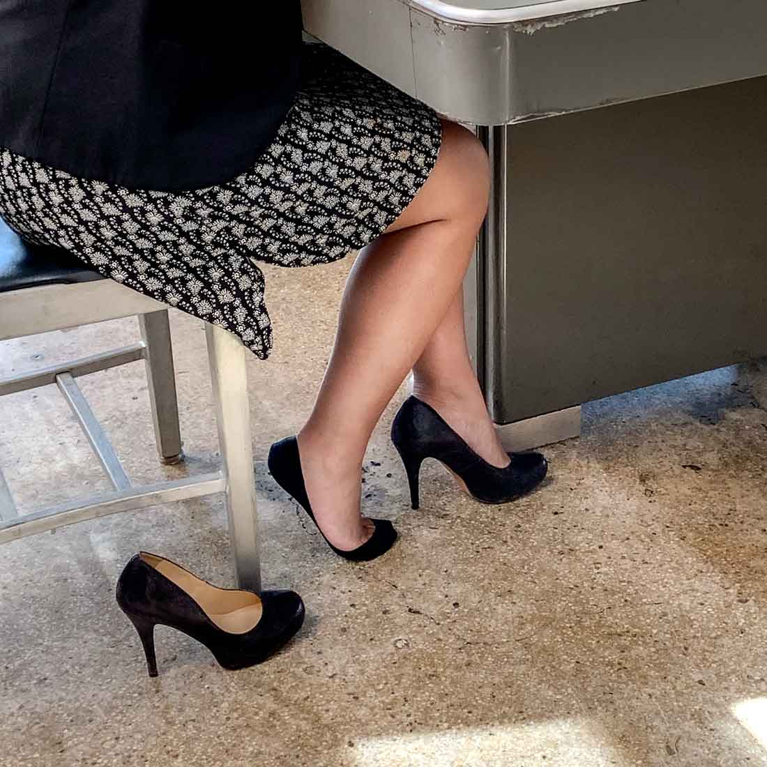 A pair of black ultra low-cut no show socks designed for comfort and style, perfect for wearing with heels and ballet flats.