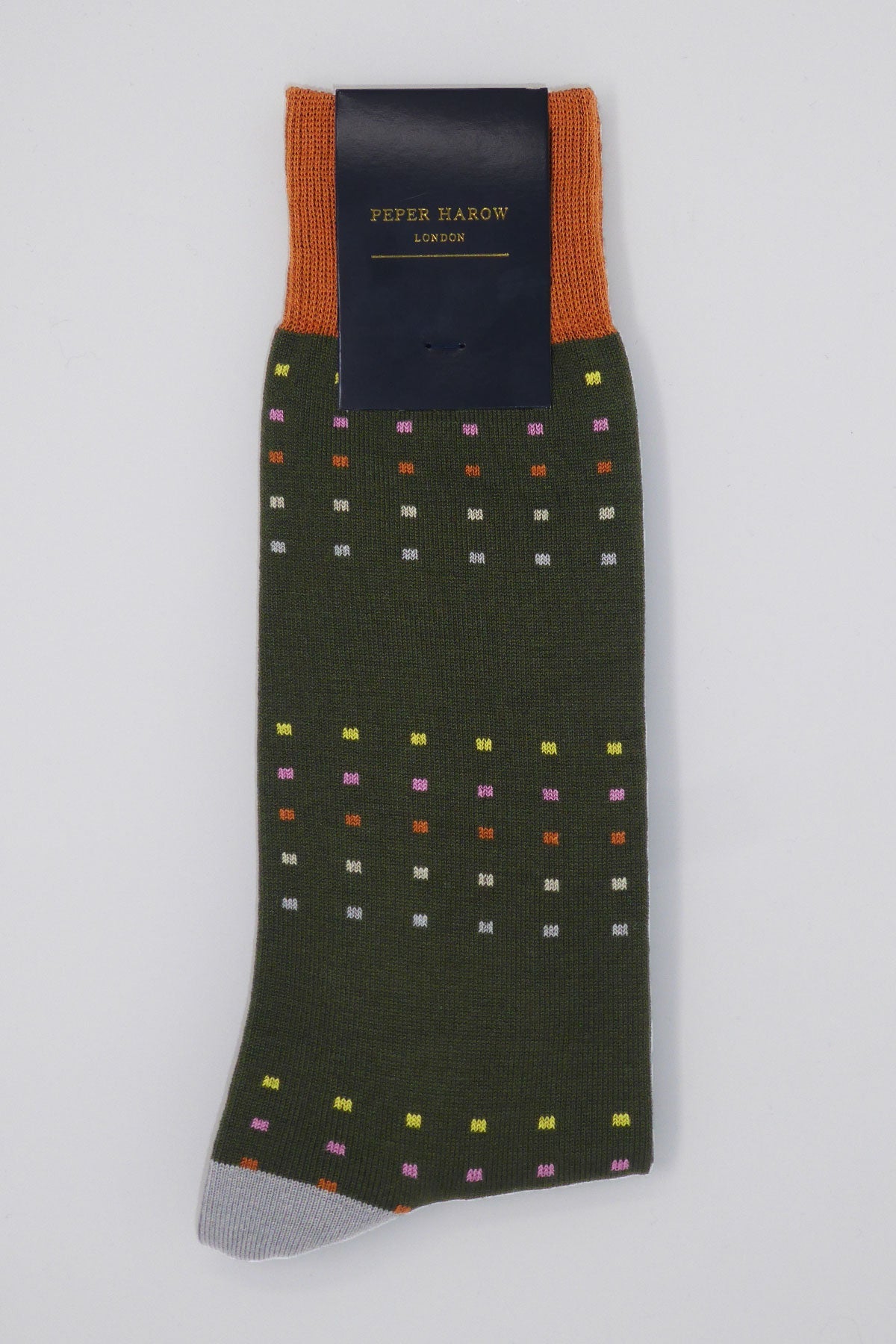 Square Polka Men's Socks in green and orange with multi-coloured square polka dots, showcasing luxury and style.