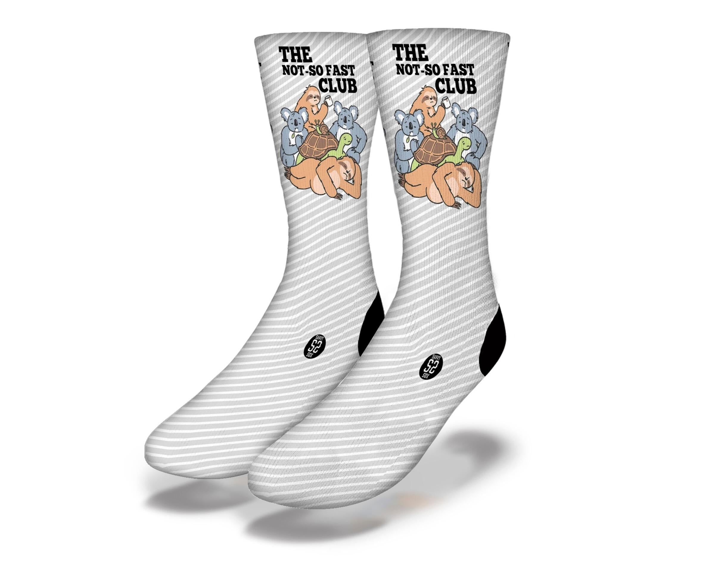 A pair of THE NOT SO FAST CLUB funny animal socks featuring sloths, turtles, snails, and koalas, perfect for cozy lounging.