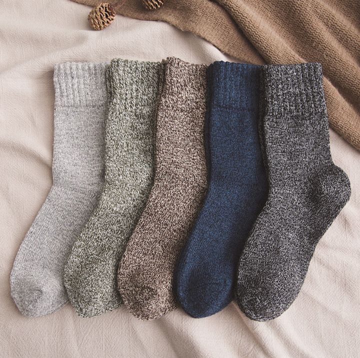 A cozy 6-pack of thick wool socks for men, made from soft thermal lamb wool, featuring assorted colors.