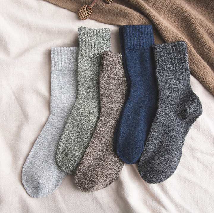 A cozy 6-pack of thick wool socks for men, made from soft thermal lamb wool, featuring assorted colors.