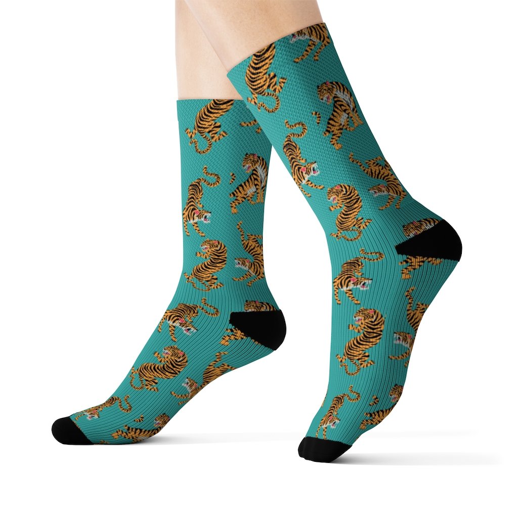 A pair of stylish Tiger Fun Novelty Socks featuring a vibrant tiger print design, perfect for adding flair to any outfit.