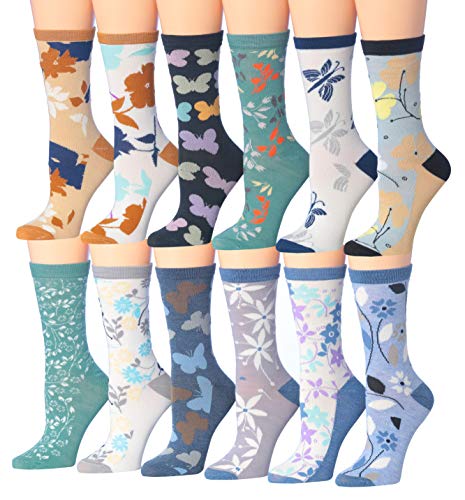 A colorful assortment of Tipi Toe women's crew socks featuring various vibrant patterns and designs, neatly arranged in pairs.