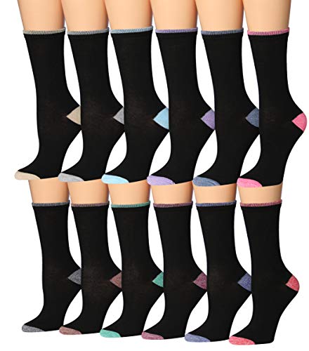 A colorful assortment of Tipi Toe Women's crew socks featuring various patterns and designs, neatly arranged in pairs.