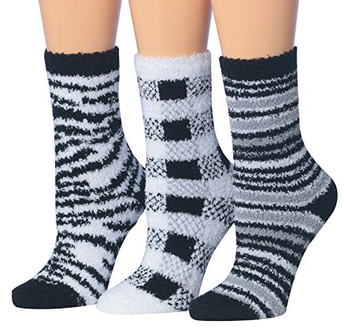 Tipi Toe Women's 3-Pairs Black and White Monochrome Anti-Slip Soft Socks displayed in a cozy setting, showcasing their fuzzy texture and stylish design.