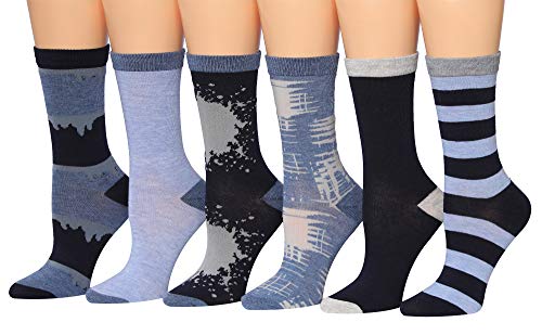 A collection of six pairs of Tipi Toe women's colorful patterned crew dress socks displayed together, showcasing vibrant designs.