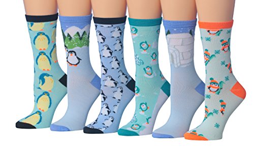 A colorful assortment of Tipi Toe women's winter socks featuring playful penguin designs, perfect for cozy wear.