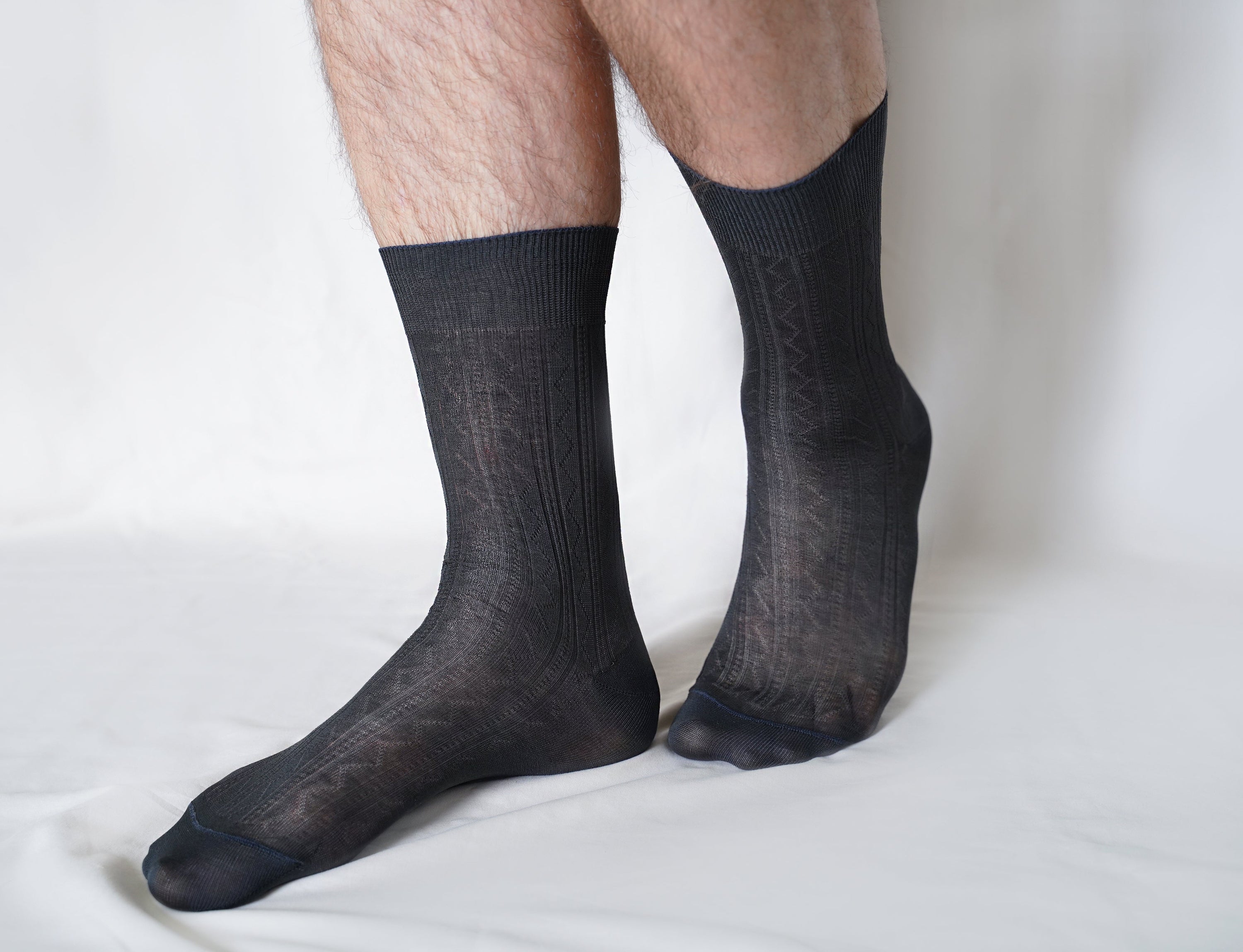 A pair of luxurious tittimitti® 100% Mercerized 'Filo di Scozia' Cotton Men's Dress Socks, showcasing their silky smooth texture and elegant design.