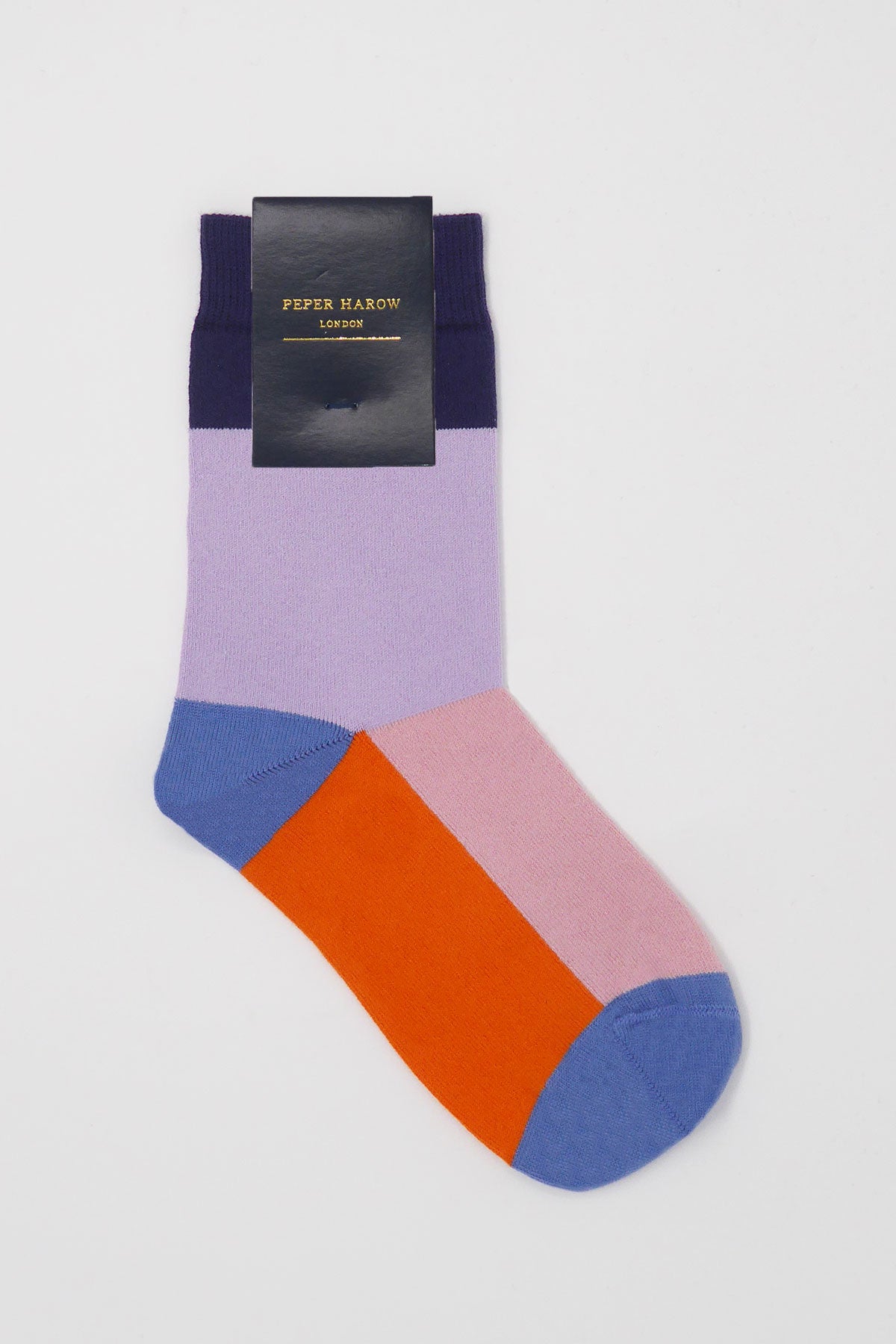 A pair of vibrant lavender Victoria Women's Socks featuring contrasting colors including navy, pink, blue, and orange, elegantly displayed.