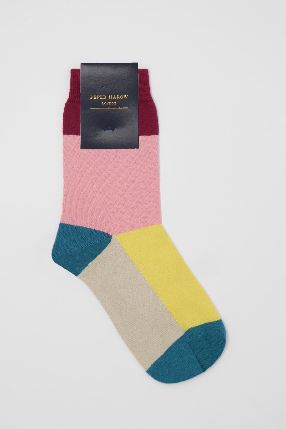 A pair of vibrant pink Victoria Women's Socks with contrasting colors, showcasing luxurious Supima cotton and seamless toe design.