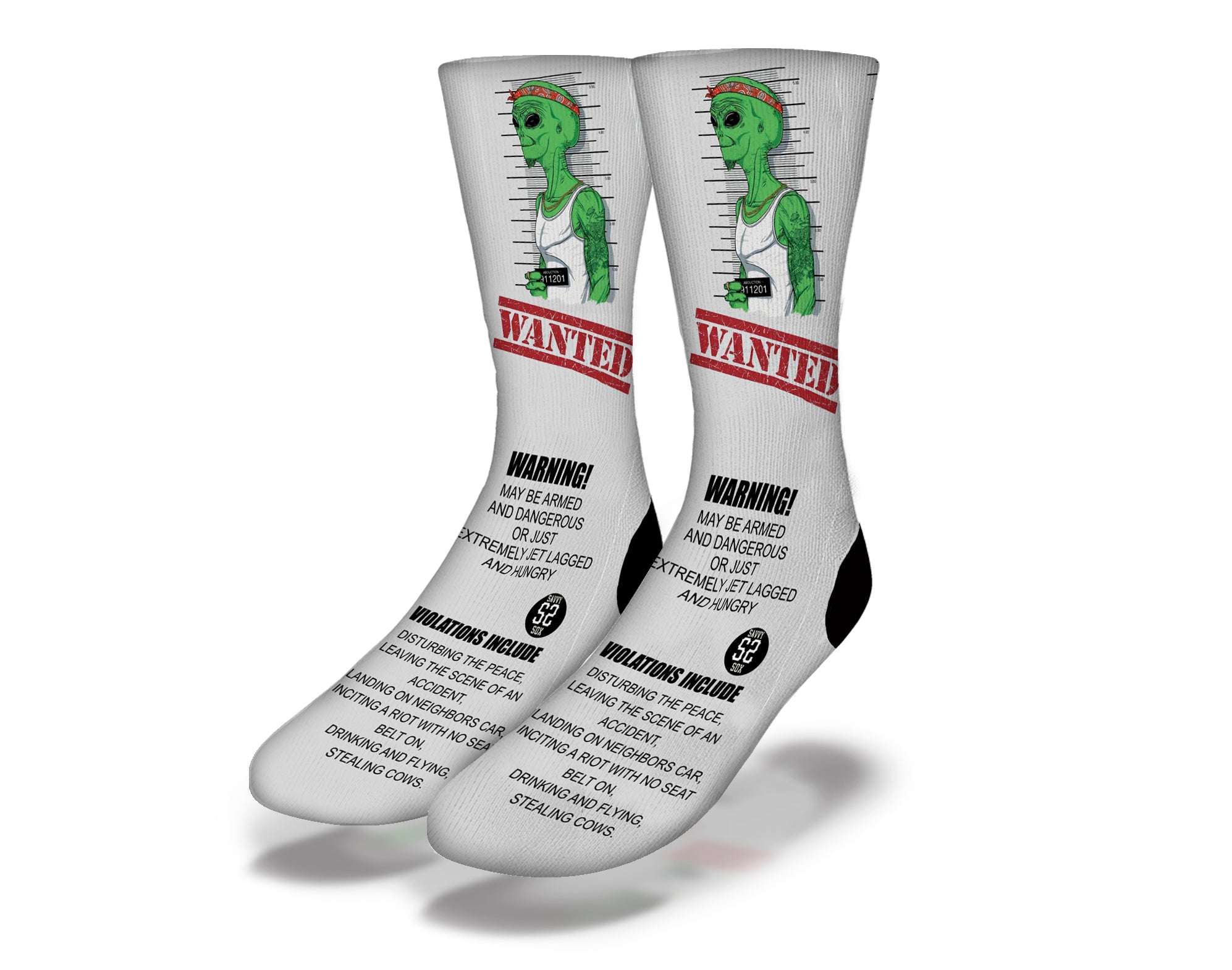 A pair of vibrant Wanted Alien Socks featuring a playful alien design, perfect for quirky fashion lovers.