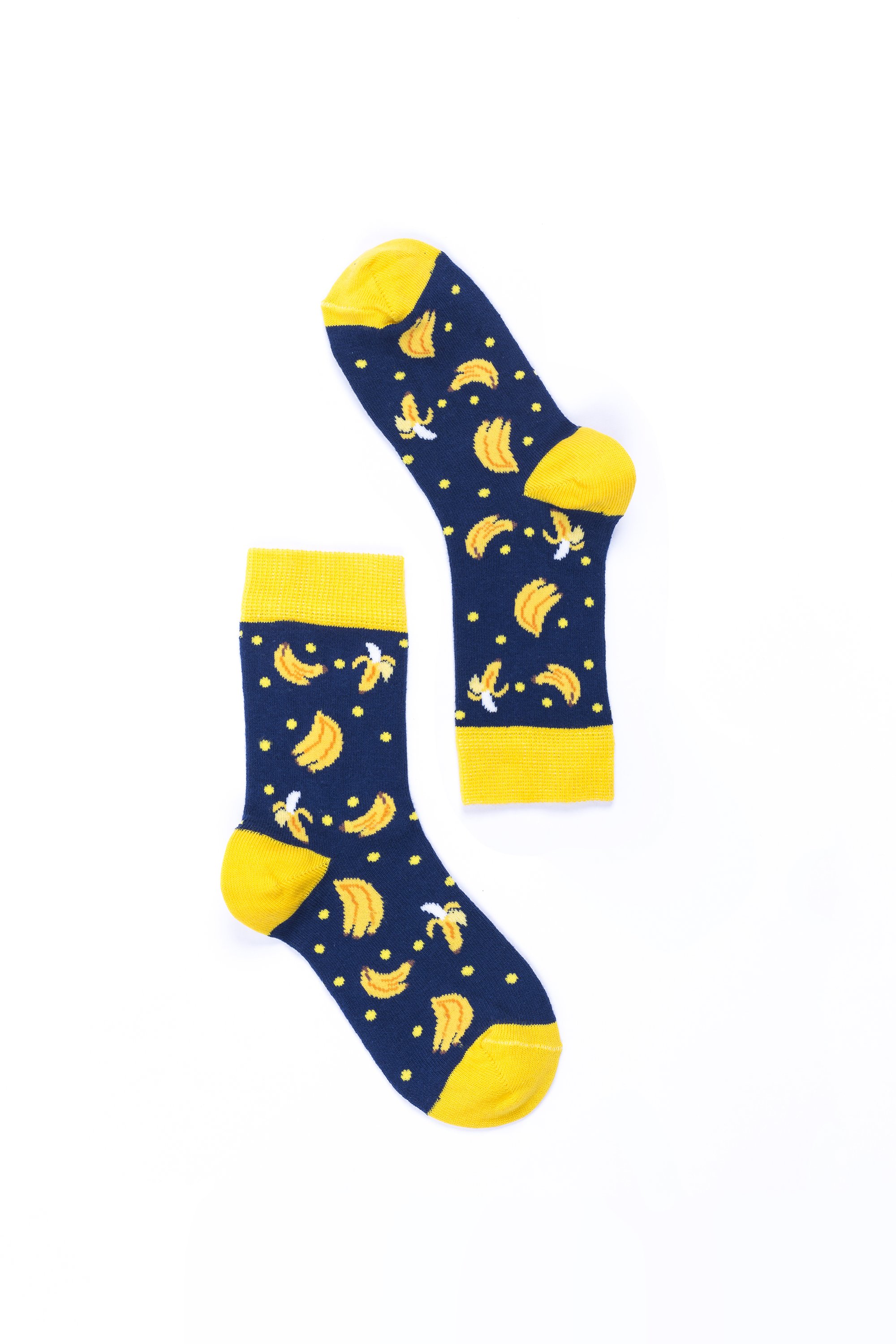 A pair of colorful Women's Banana Socks featuring a fun banana pattern, made from soft Turkish cotton for comfort.