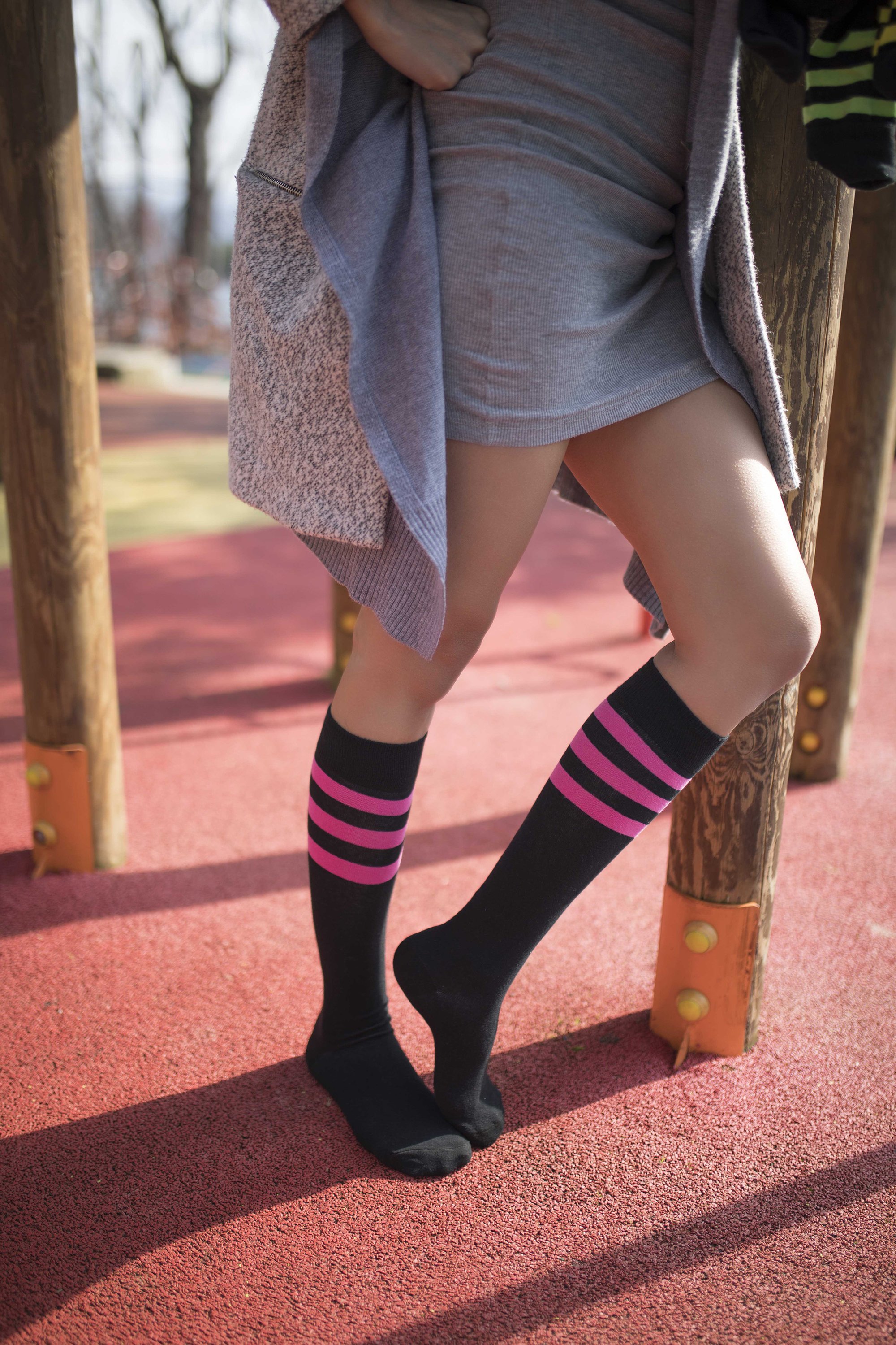 Women's Black Candy Stripe Knee High Socks featuring a trendy design with colorful stripes, perfect for adding style to any outfit.