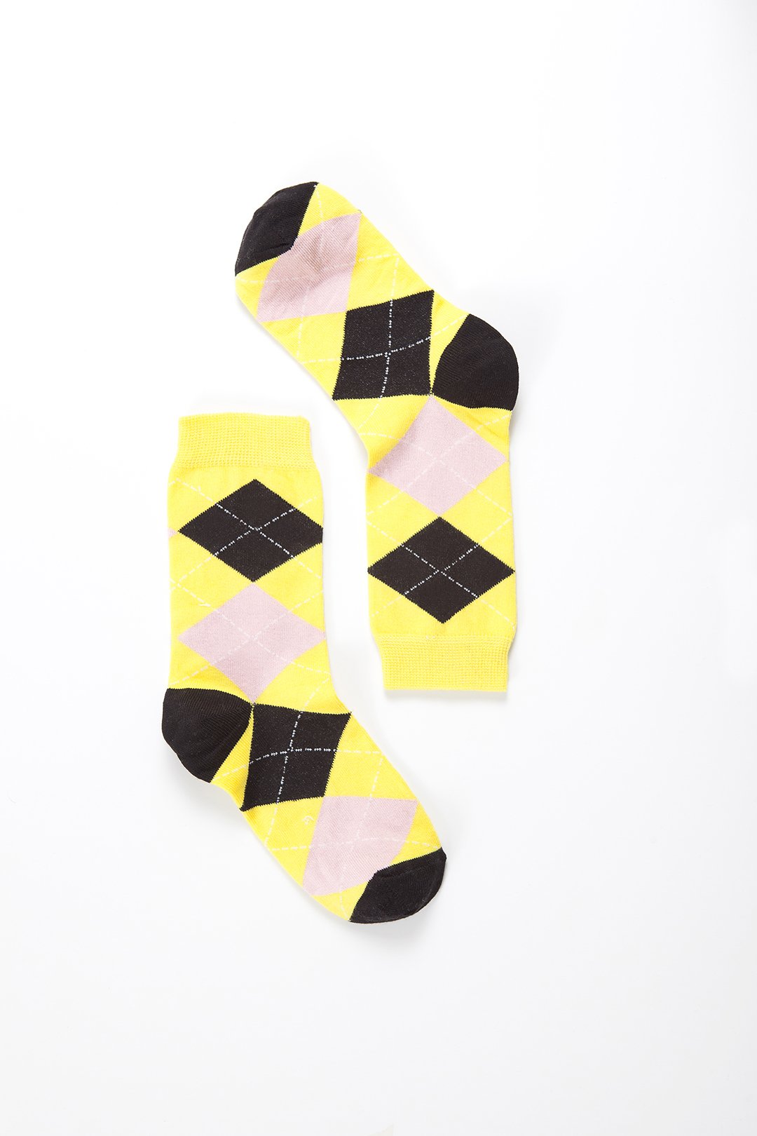 A pair of Women's Black Pineapple Argyle Socks featuring a vibrant pineapple pattern on a black background, perfect for adding a fun touch to any outfit.