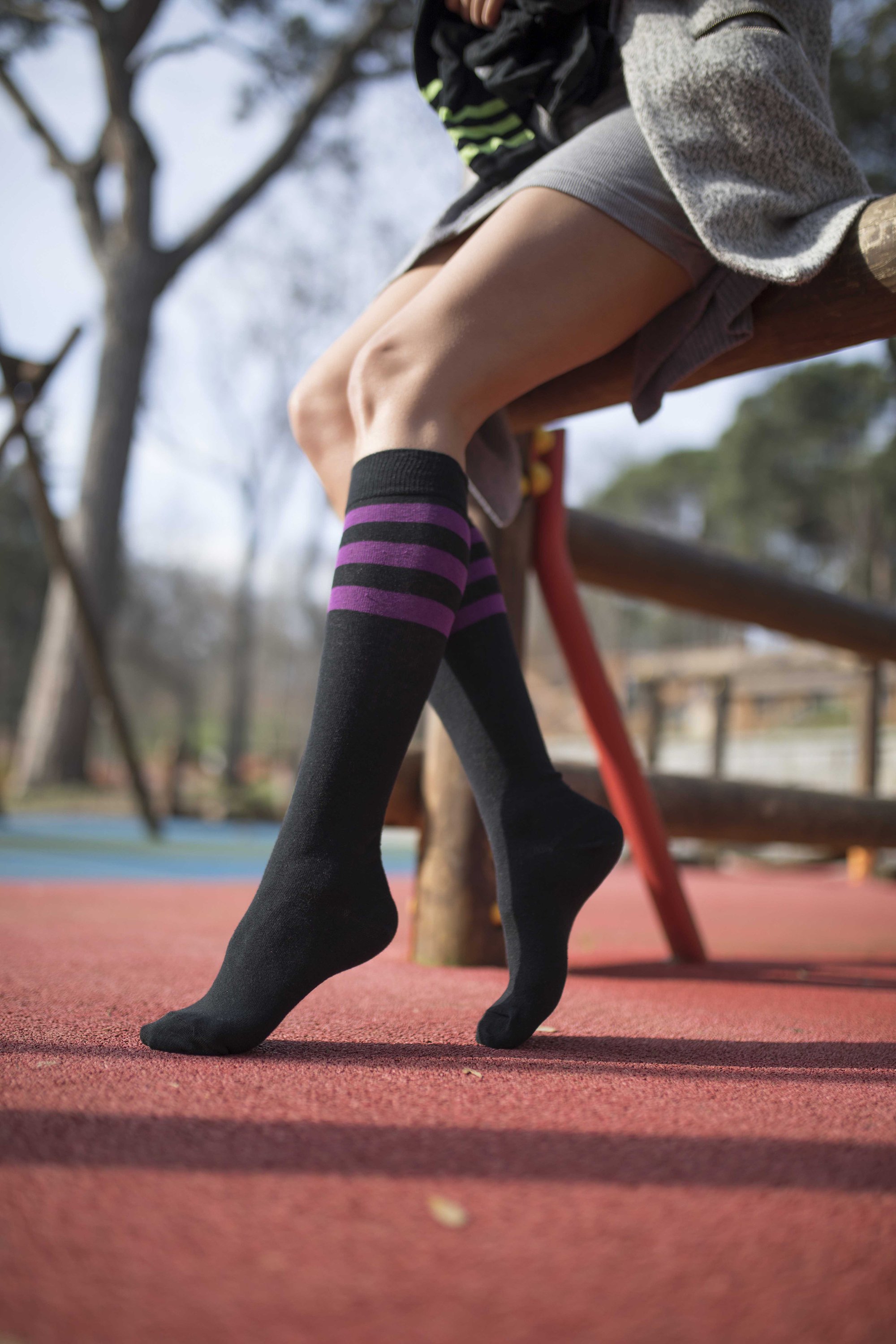 Women's Black Plum Stripe Knee High Socks featuring a stylish design with vibrant colors and a comfortable fit.