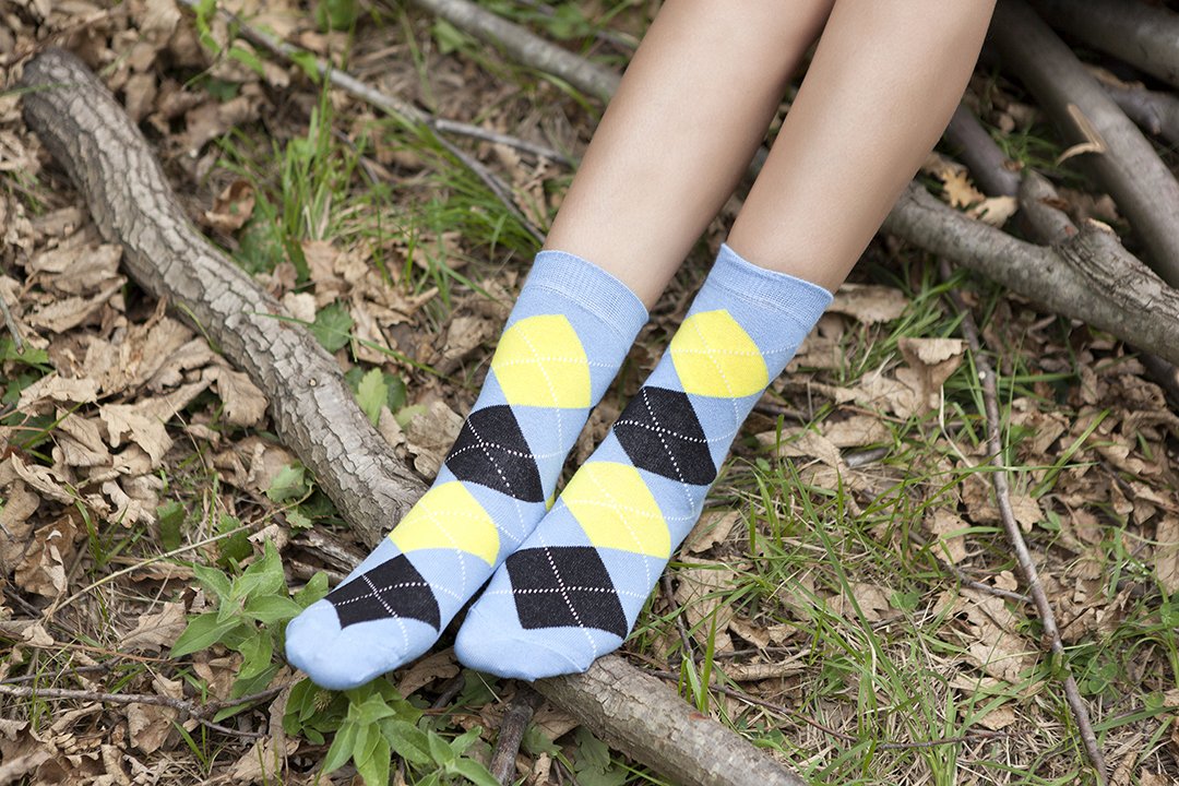 Women's Blue Sky Argyle Socks featuring a vibrant blue and multicolor argyle pattern, made from soft Turkish cotton for comfort.