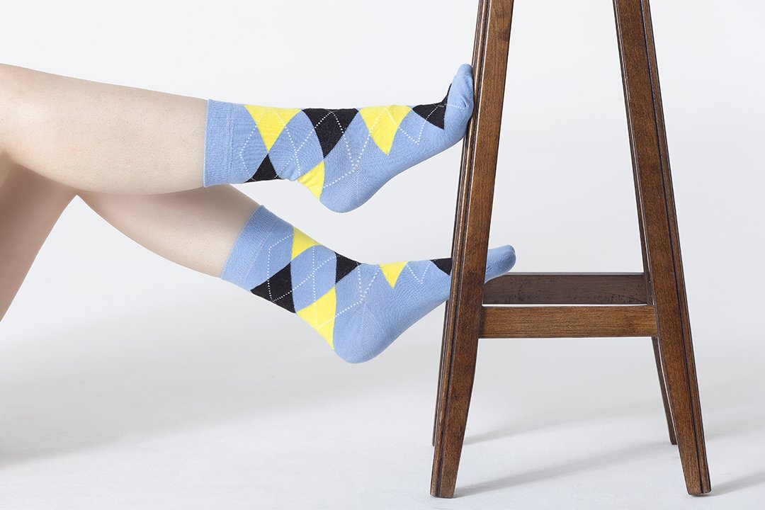 Women's Blue Sky Argyle Socks featuring a vibrant blue and multicolor argyle pattern, made from soft Turkish cotton for comfort.