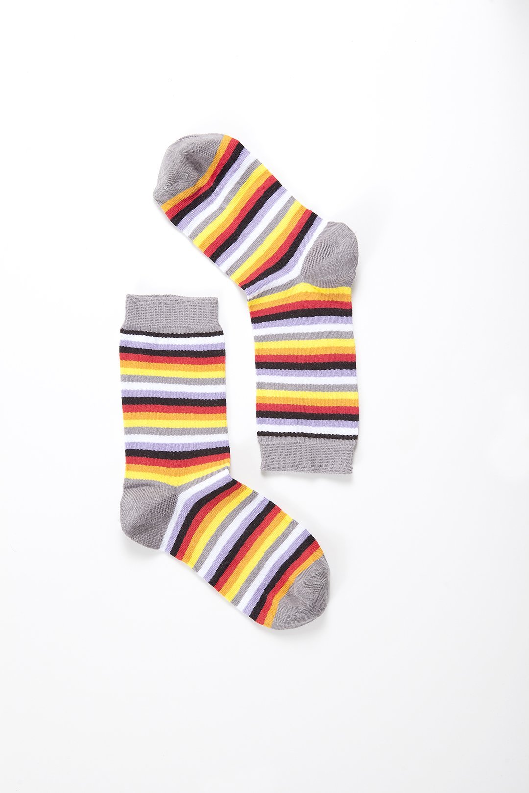 A pair of colorful Women's Cloud Stripe Socks featuring trendy patterns and soft fabric, perfect for adding style to any outfit.