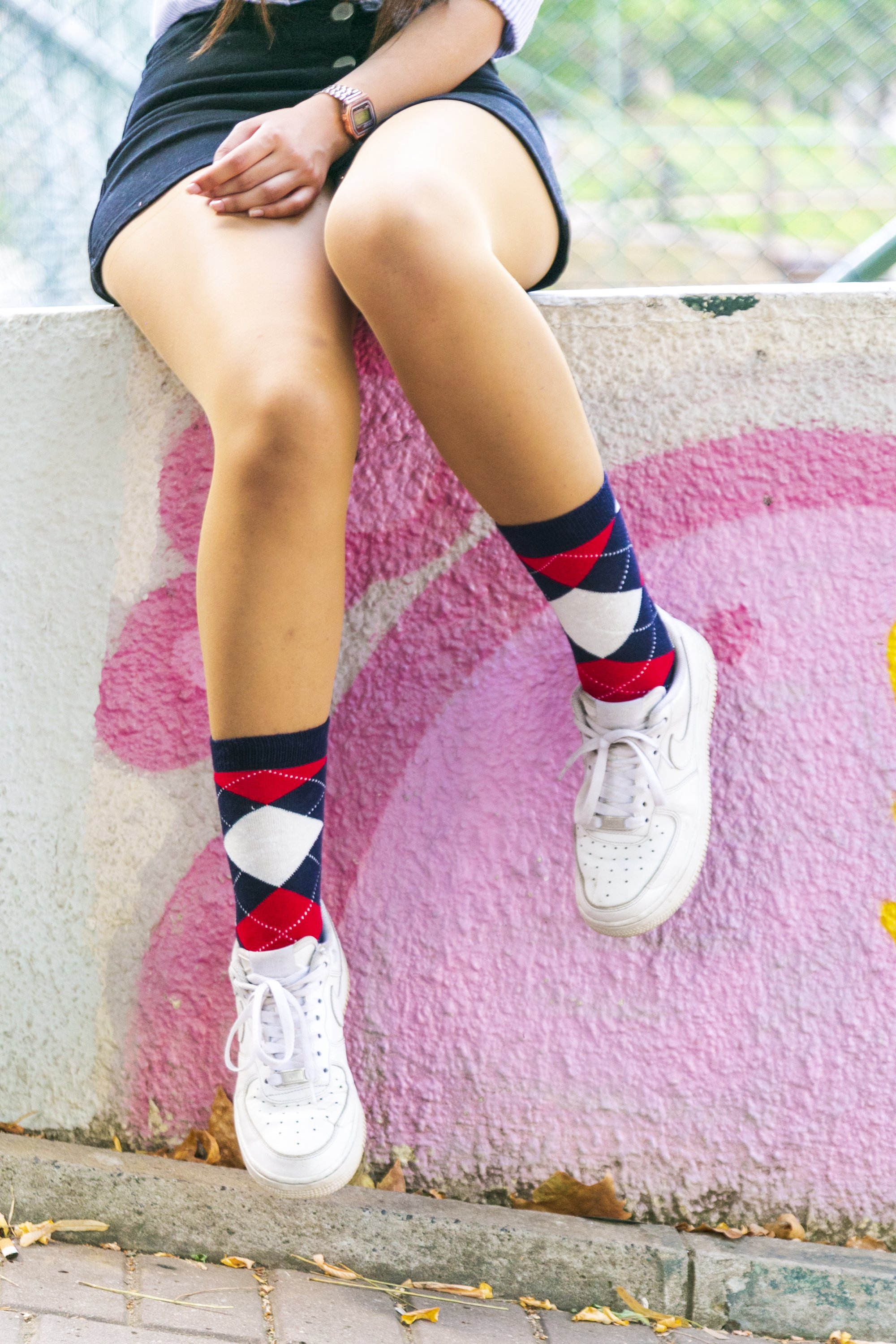 A pair of Women's Denim Argyle Socks featuring a colorful and trendy design, made from soft cotton for comfort.