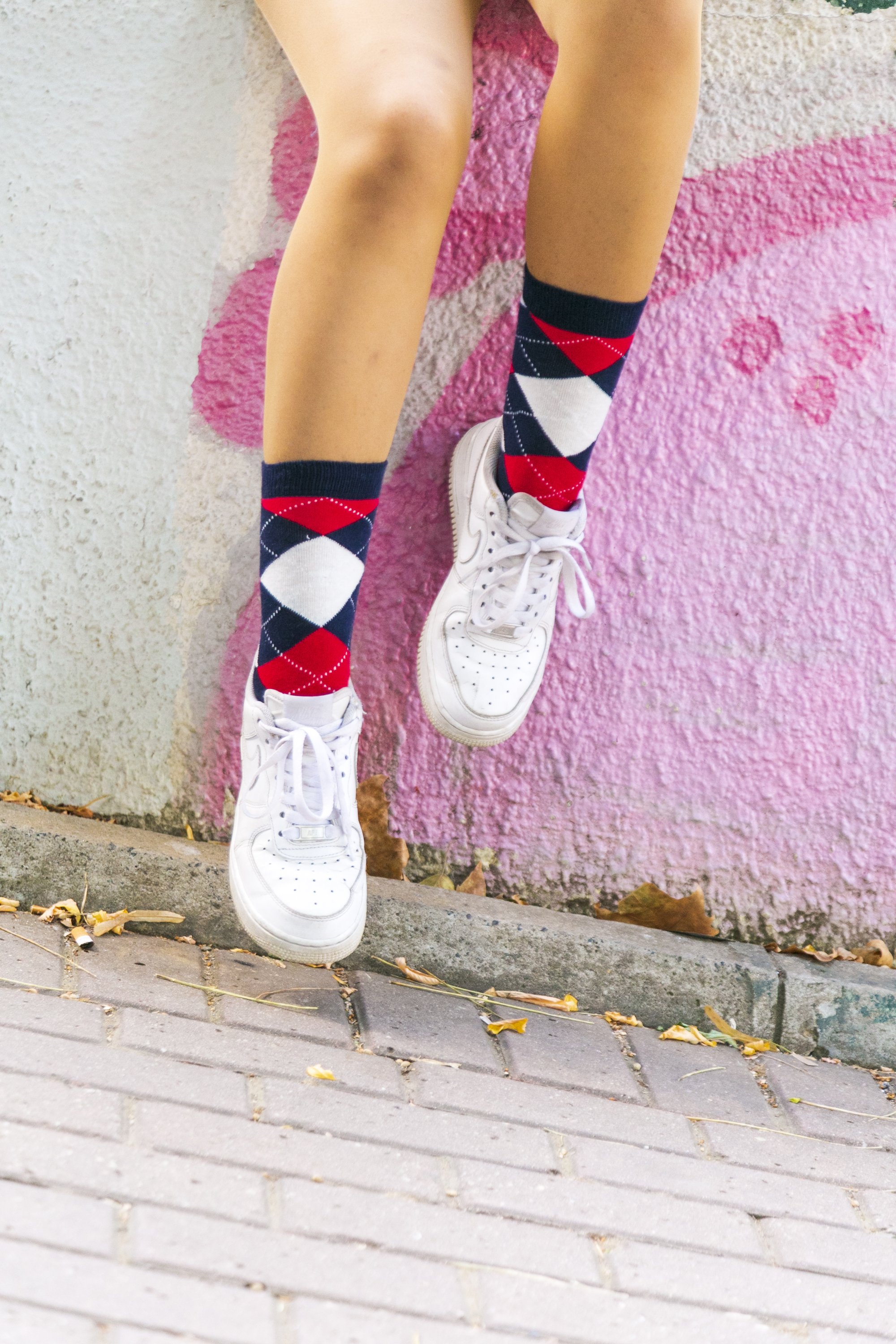 A pair of Women's Denim Argyle Socks featuring a colorful and trendy design, made from soft cotton for comfort.