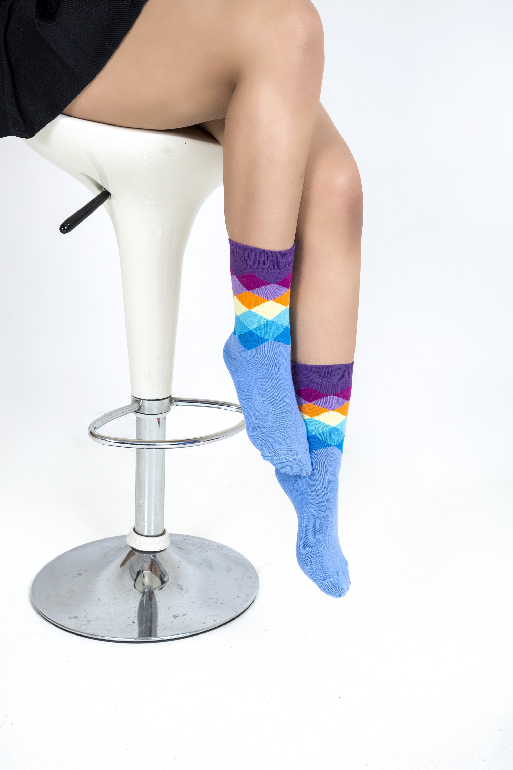 A pair of Women's Dream Purple Diamond Socks featuring a vibrant purple diamond pattern, made from soft Turkish cotton for comfort and style.