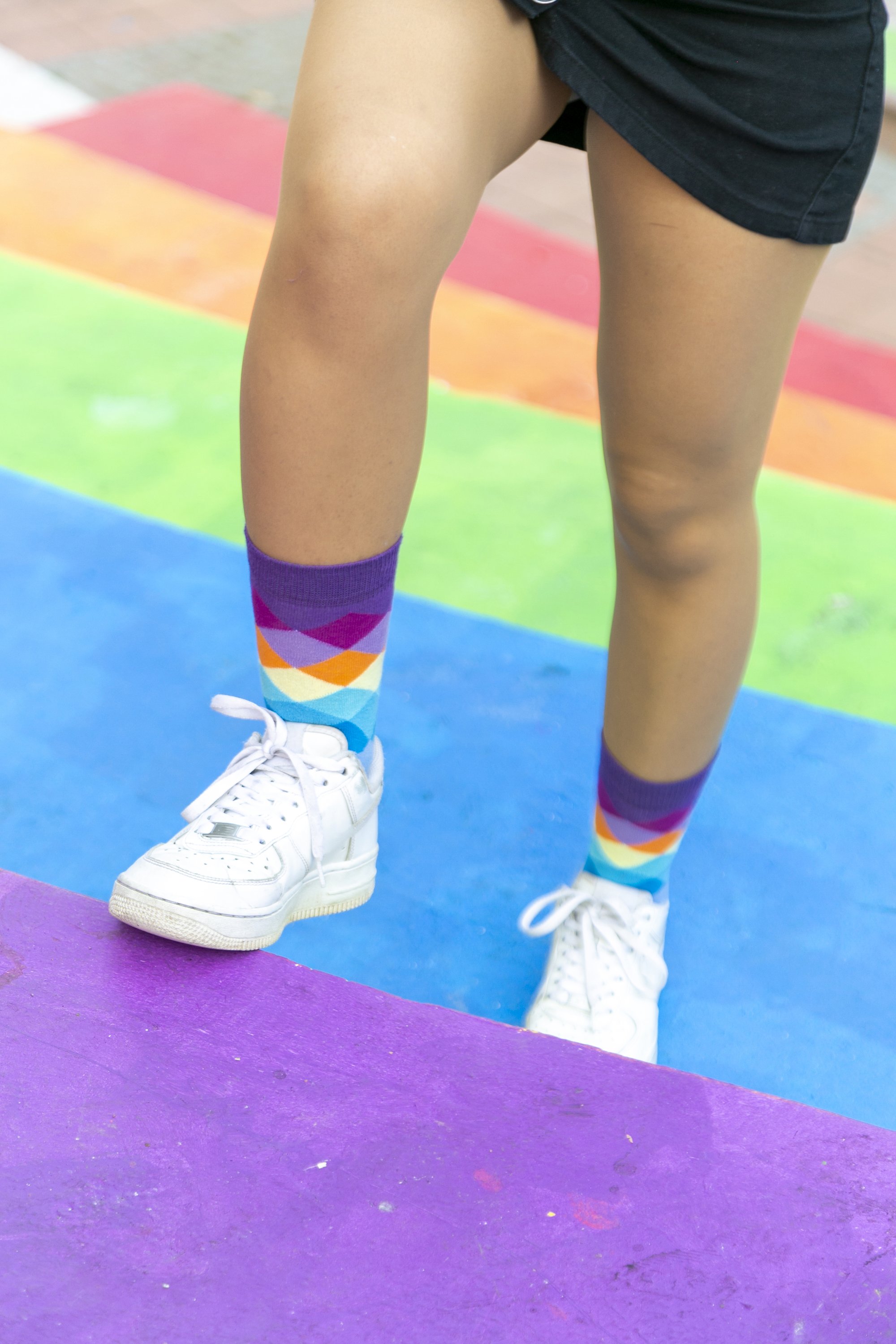 A pair of Women's Dream Purple Diamond Socks featuring a vibrant purple diamond pattern, made from soft Turkish cotton for comfort and style.