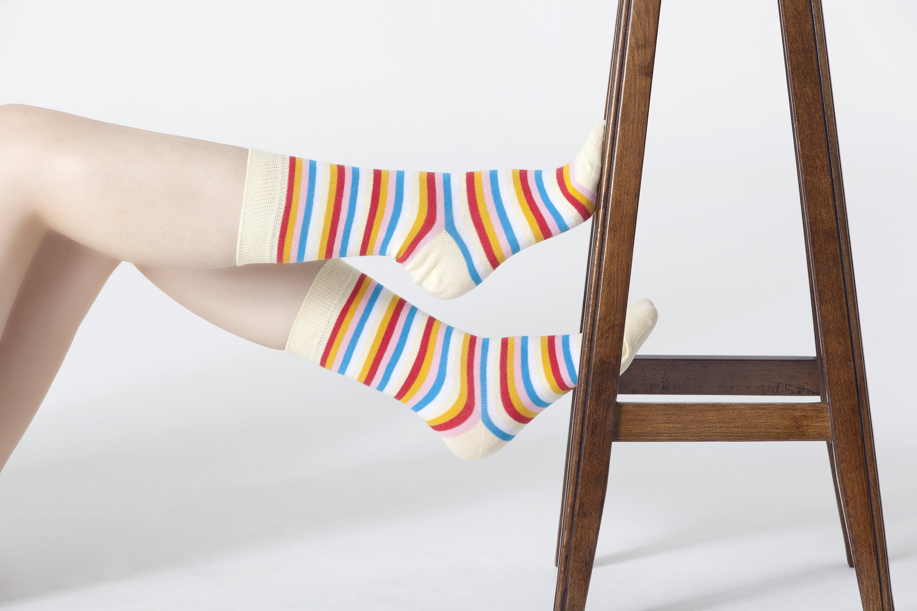 Colorful Women's Eggnog Stripe Socks made from soft cotton, featuring a trendy design perfect for adding flair to any outfit.