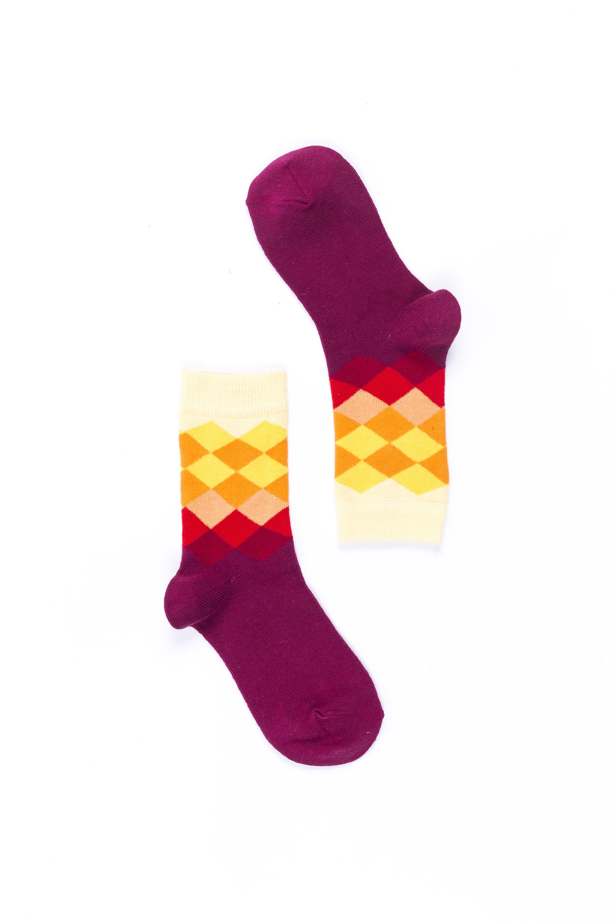 A pair of Women's Flame Diamond Socks featuring colorful and trendy patterns, made from soft Turkish cotton for comfort.