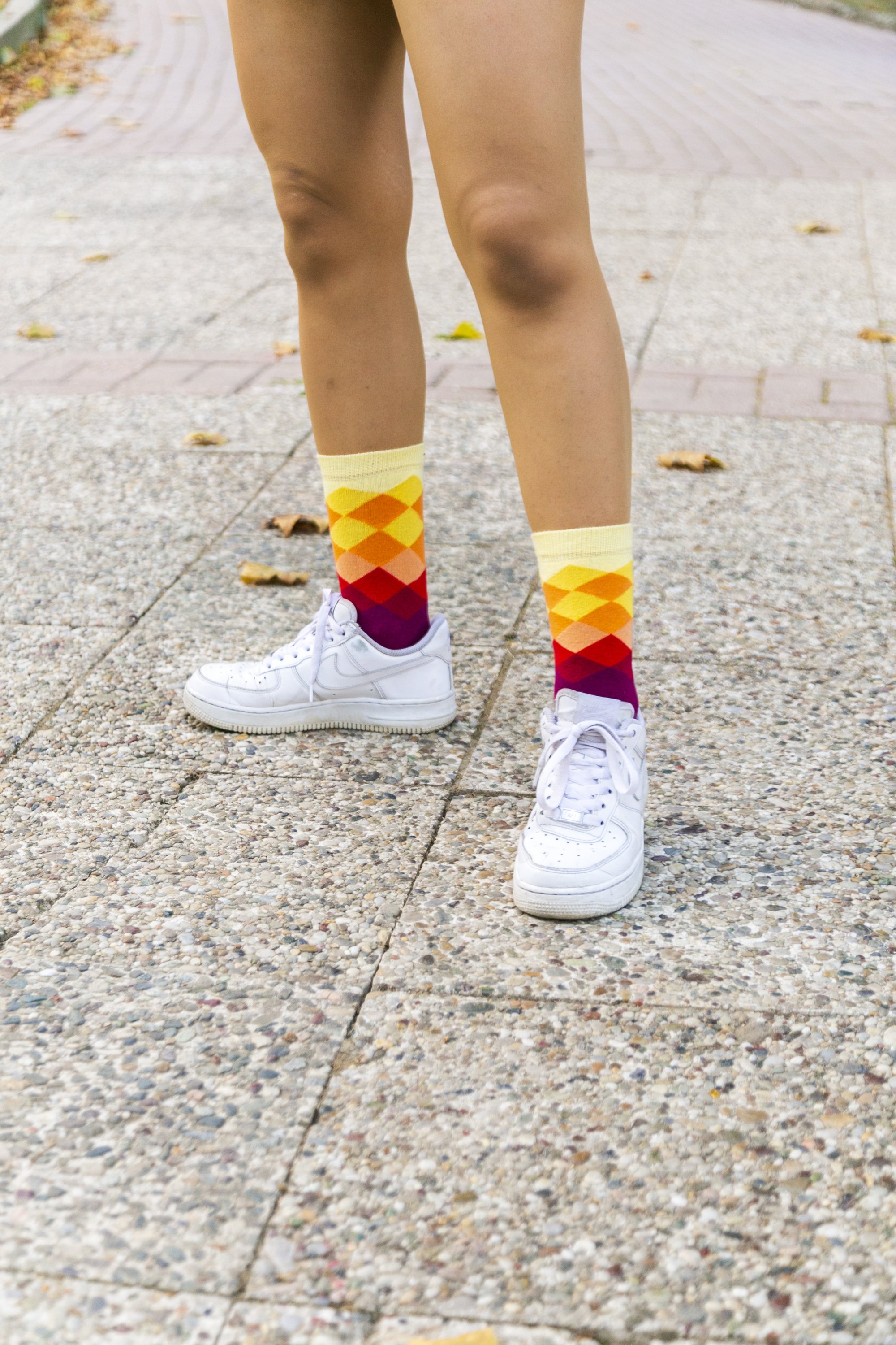 A pair of Women's Flame Diamond Socks featuring colorful and trendy patterns, made from soft Turkish cotton for comfort.