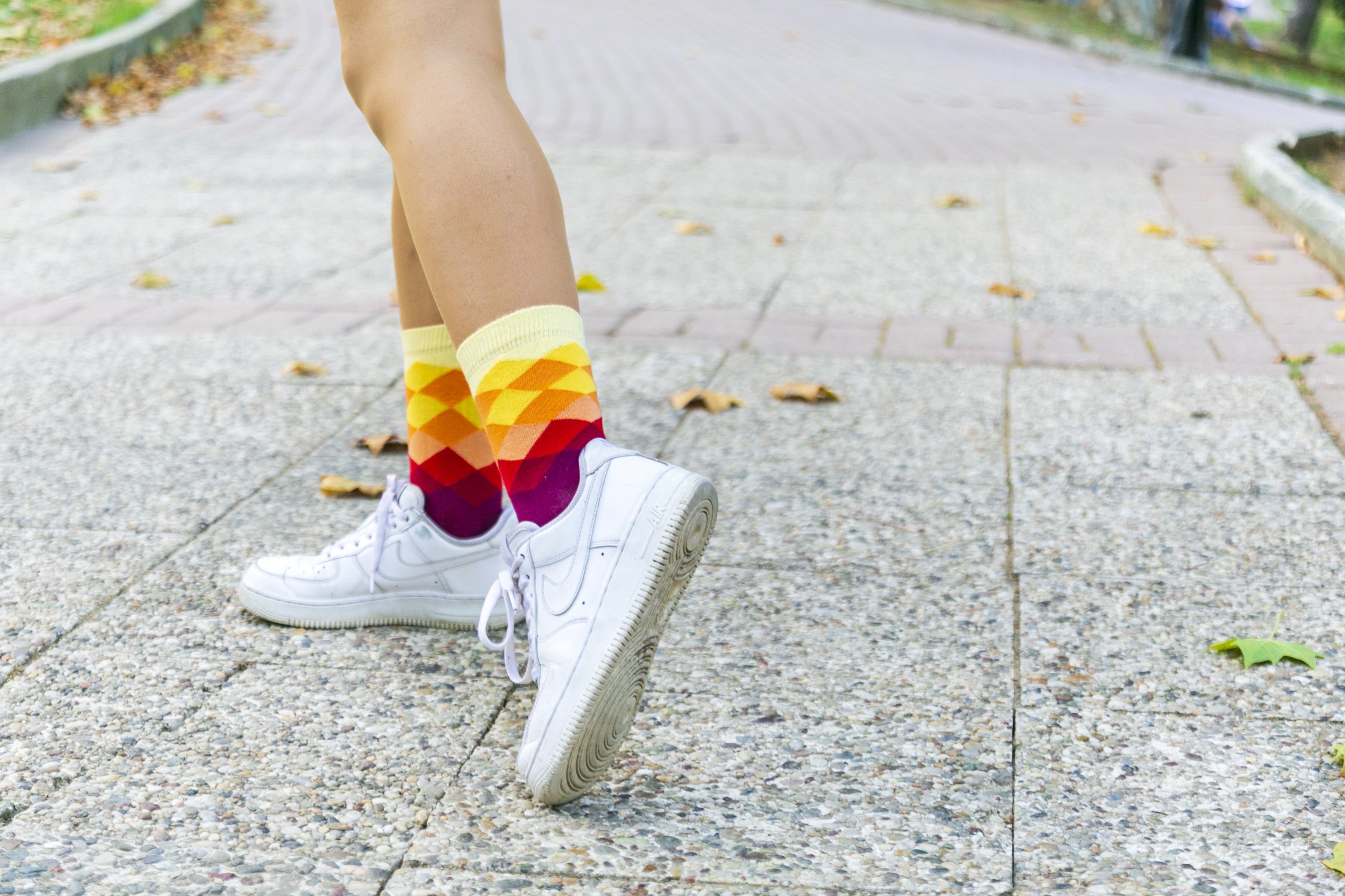 A pair of Women's Flame Diamond Socks featuring colorful and trendy patterns, made from soft Turkish cotton for comfort.