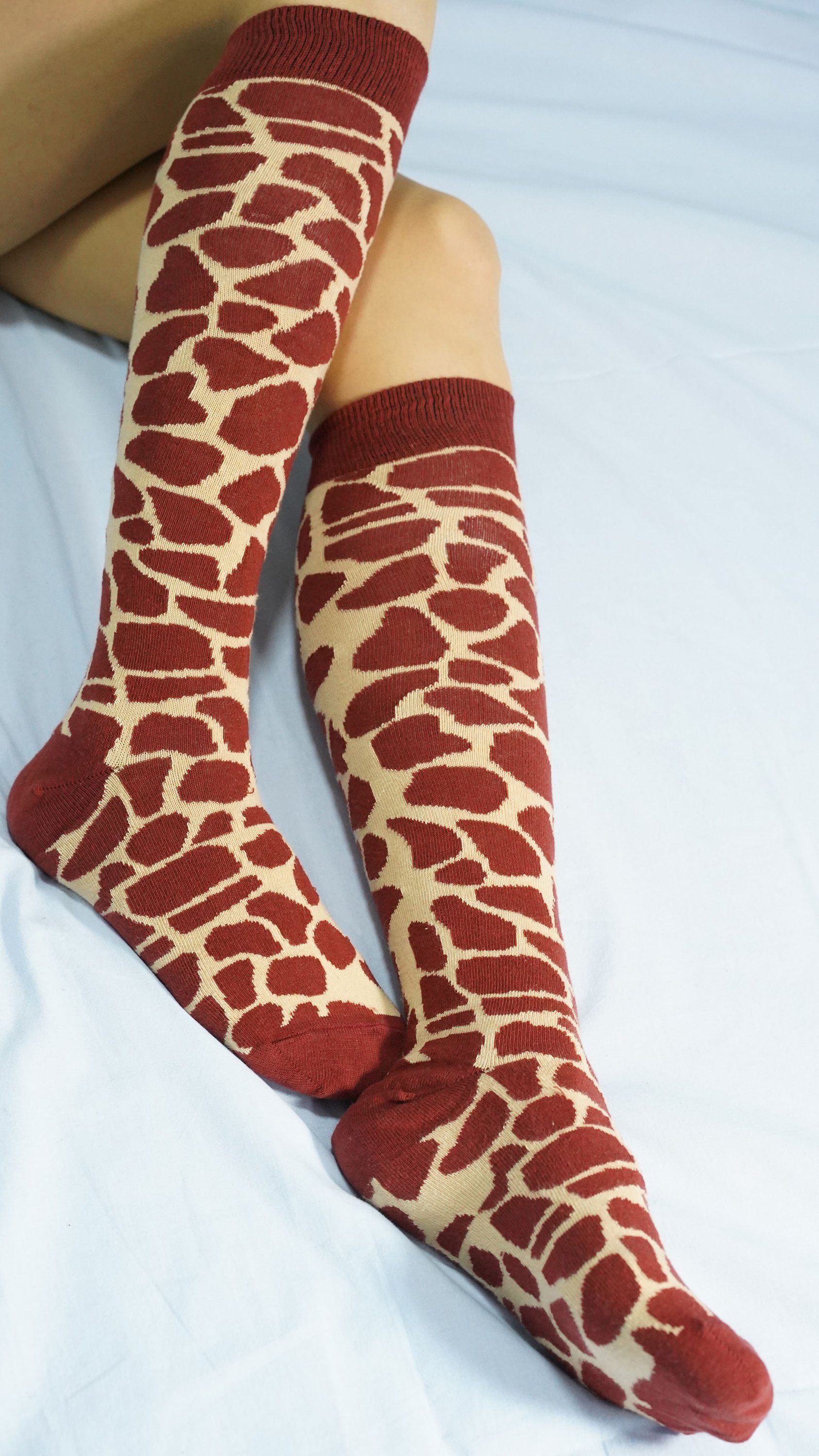 Colorful Women's Giraffe Knee High Socks featuring a playful giraffe pattern, perfect for adding a fun touch to any outfit.