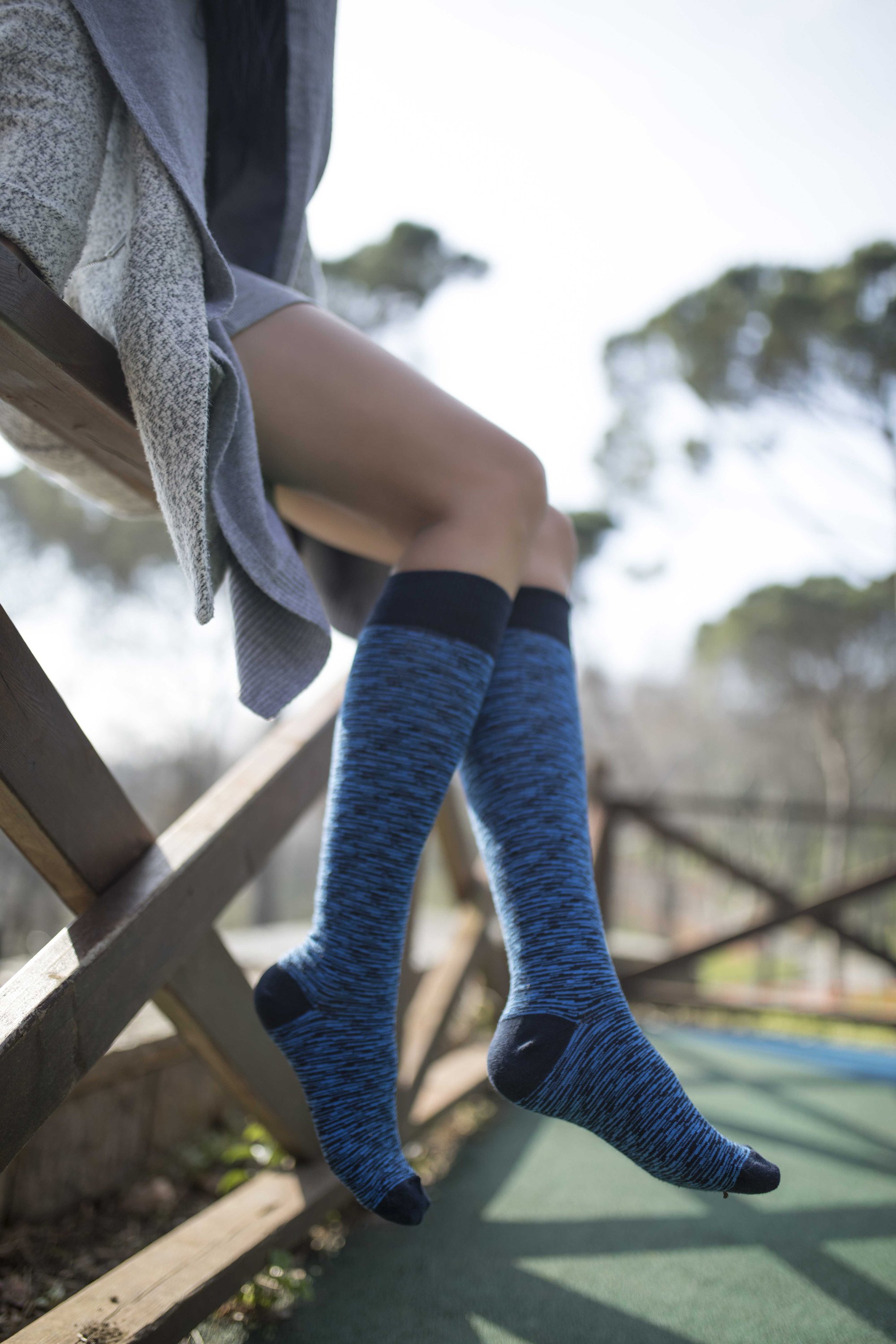 A vibrant set of Women's Grizzled Knee High Socks featuring colorful patterns and designs, perfect for adding style and comfort to any outfit.