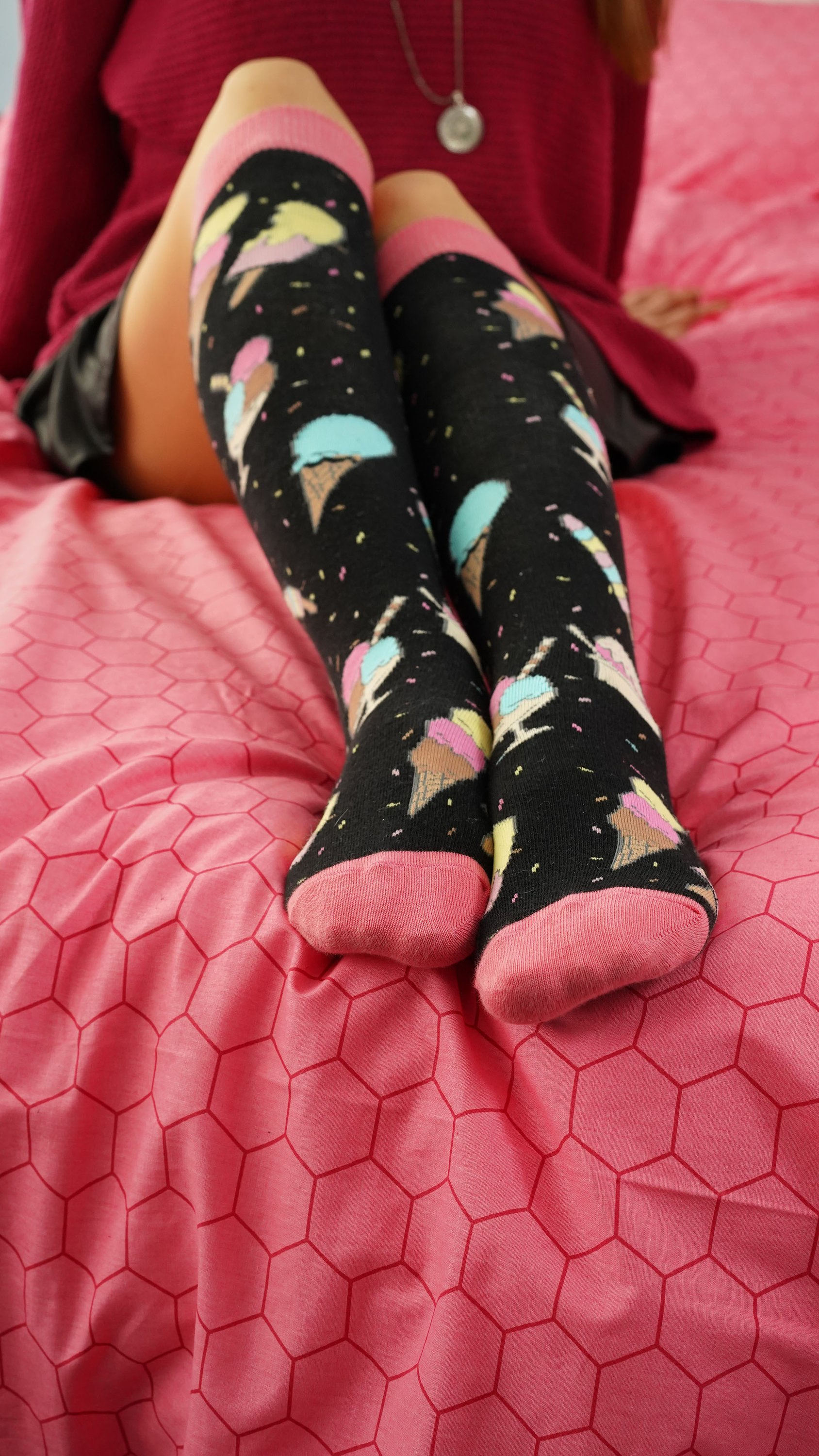 Colorful Women's Ice Cream Paradise Knee High Socks featuring fun ice cream patterns, perfect for adding a playful touch to any outfit.