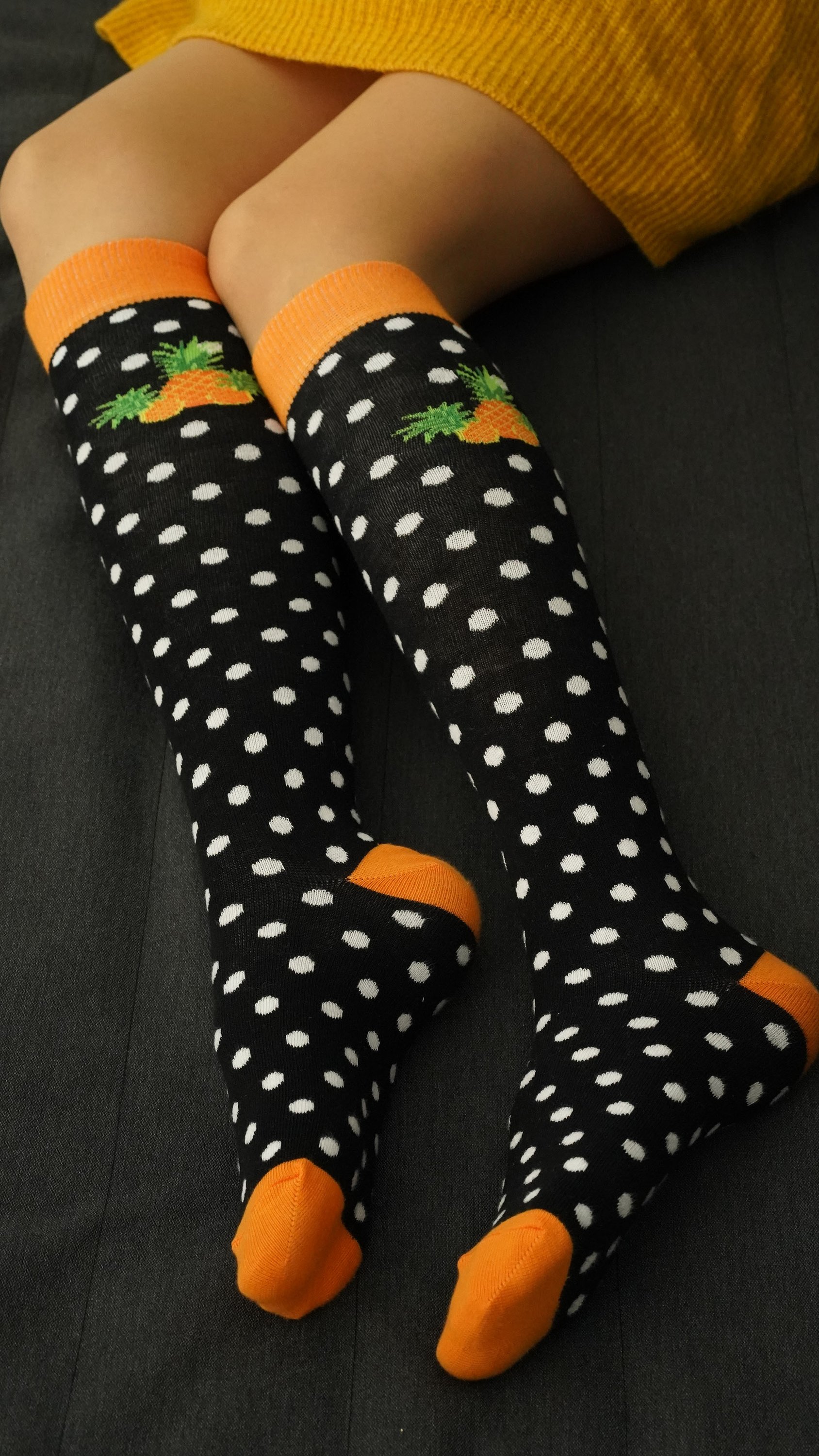 A vibrant set of Women's Juicy Fruits Knee High Socks featuring colorful patterns and a soft texture, perfect for stylish comfort.