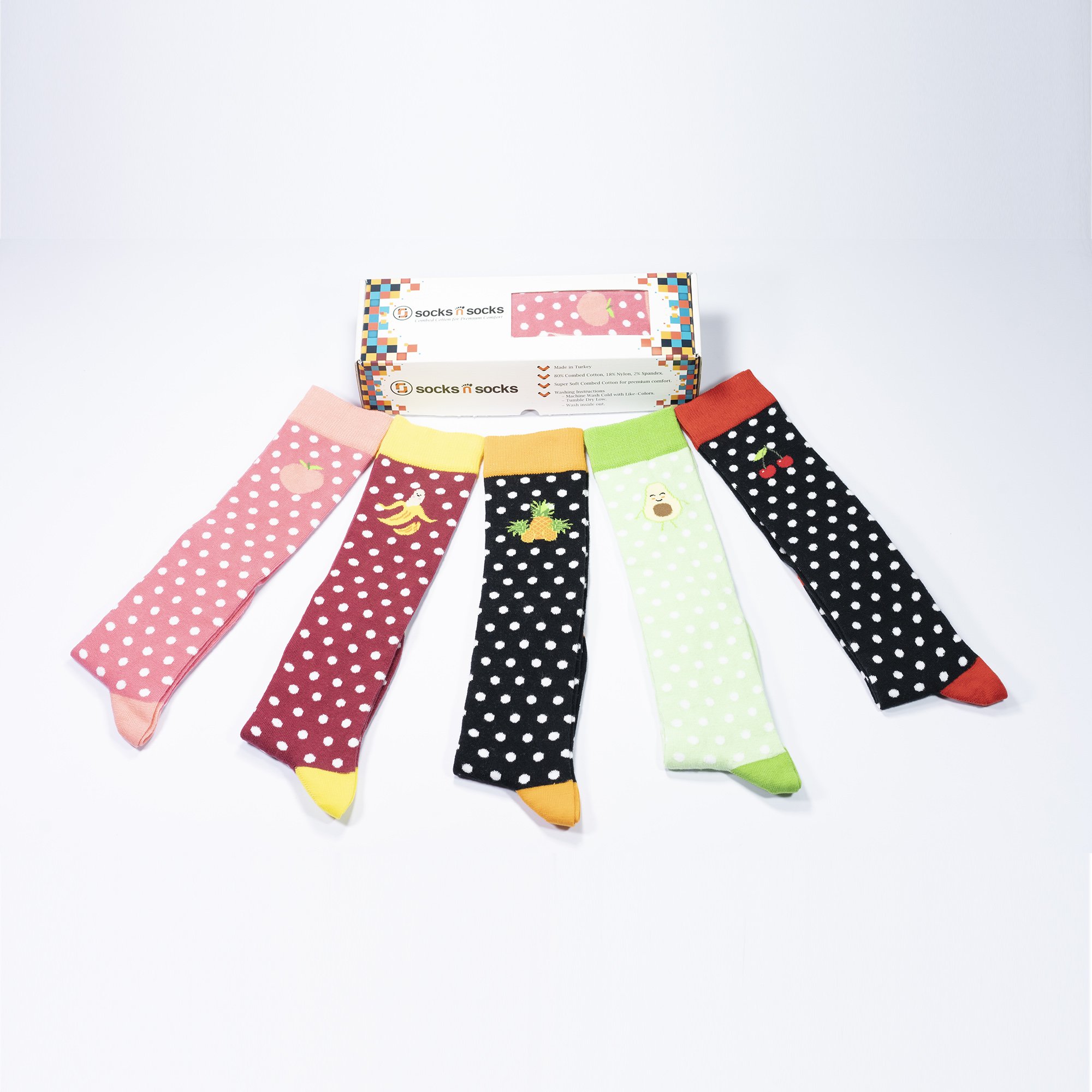 A vibrant set of Women's Juicy Fruits Knee High Socks featuring colorful patterns and a soft texture, perfect for stylish comfort.