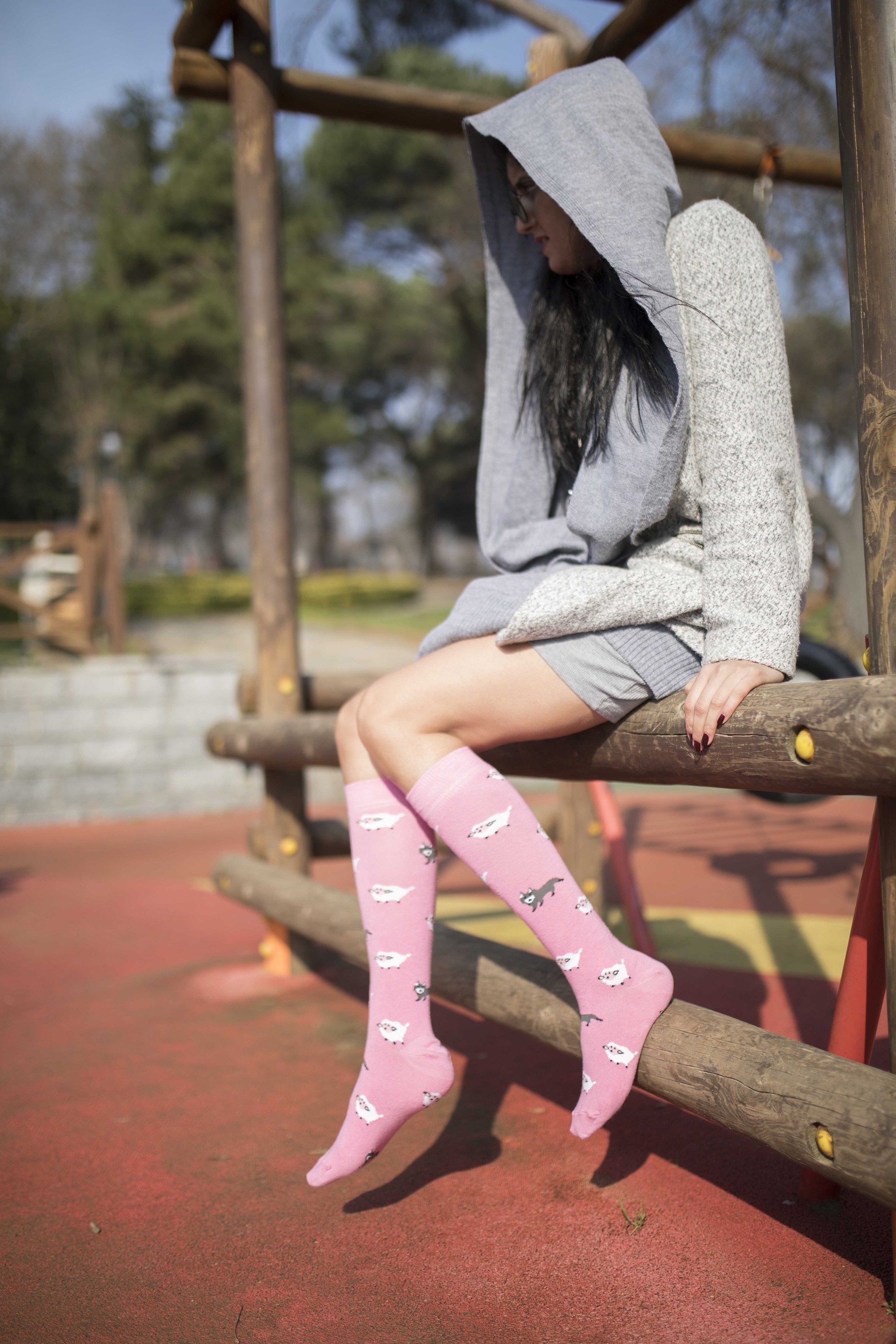 A pair of colorful Women's Lamb Knee High Socks featuring trendy patterns and made from soft Turkish cotton.