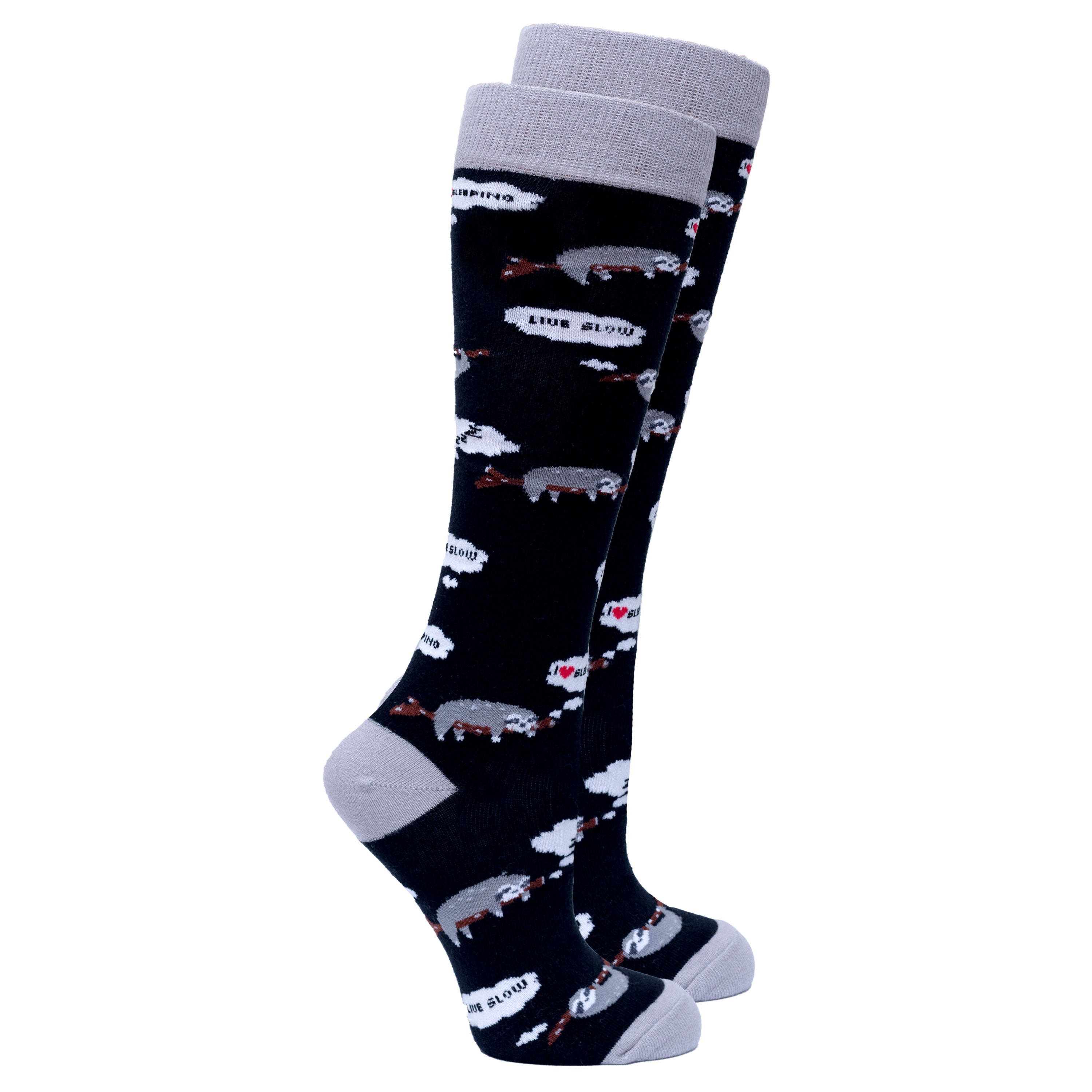 A pair of Women's Lazy Sloth Knee High Socks featuring a colorful sloth design, made from soft Turkish cotton for comfort and style.